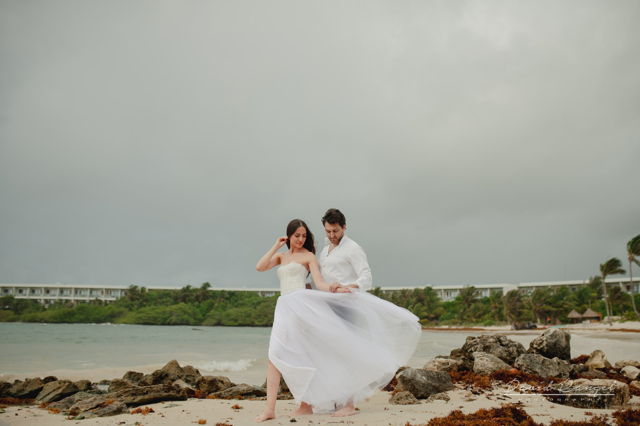 Secilia and Brandon tras the dress at the Conrad Tulum Hotel. Destination wedding photographer based in Cancun and Riviera Maya with service worldwide