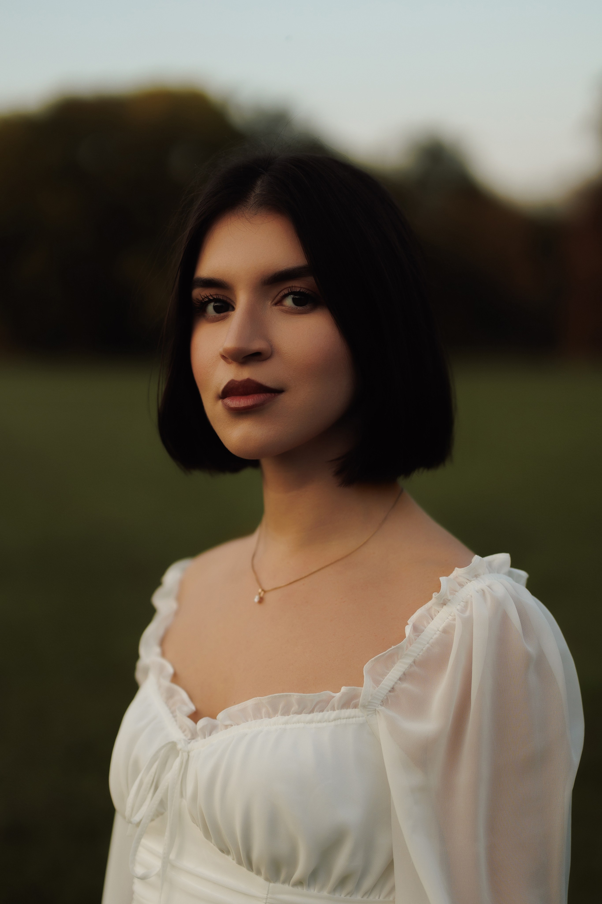 Autumn Park Photoshoot | Woman in White Dress. Cinematic&Elegant Portraits by Kristina Kozheltsova. Kristina Kozheltsova- Soulful Portrait&Lifestyle&Love Story Photographer in Leipzig, Germany
