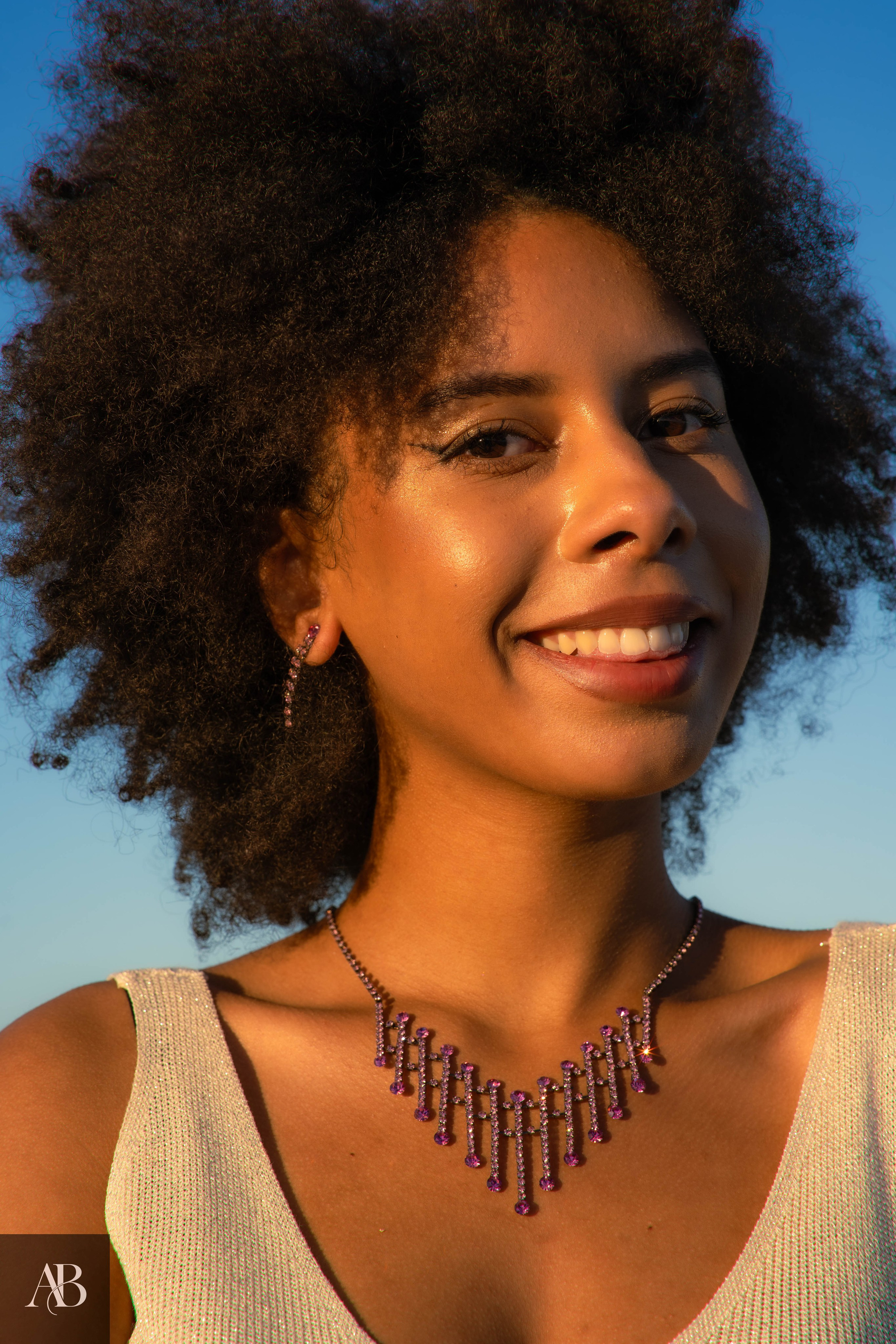 Jewelry product photography in Constanța, Romania featuring a purple gemstone necklace and matching earrings.