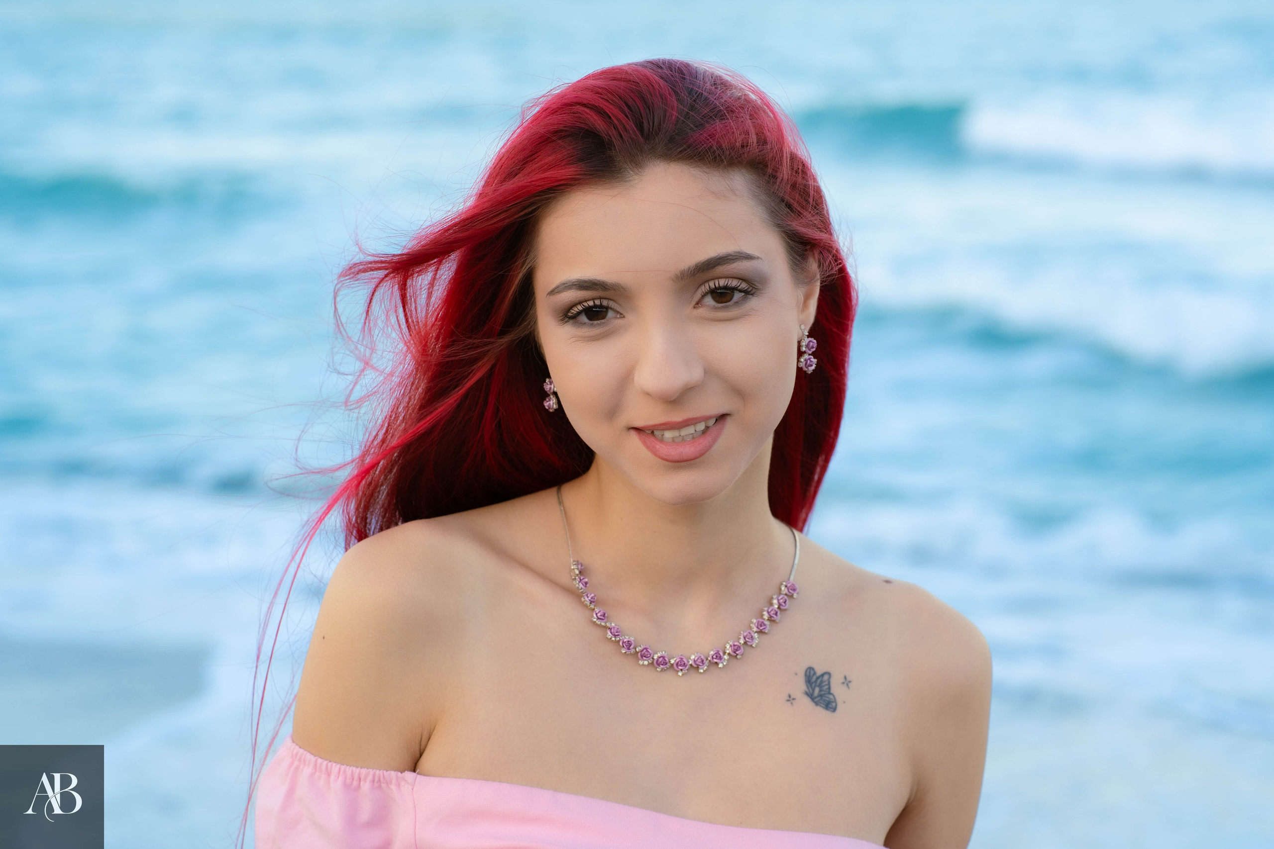Jewelry product photography in Constanța, Romania featuring a pink gemstone necklace and matching earrings.