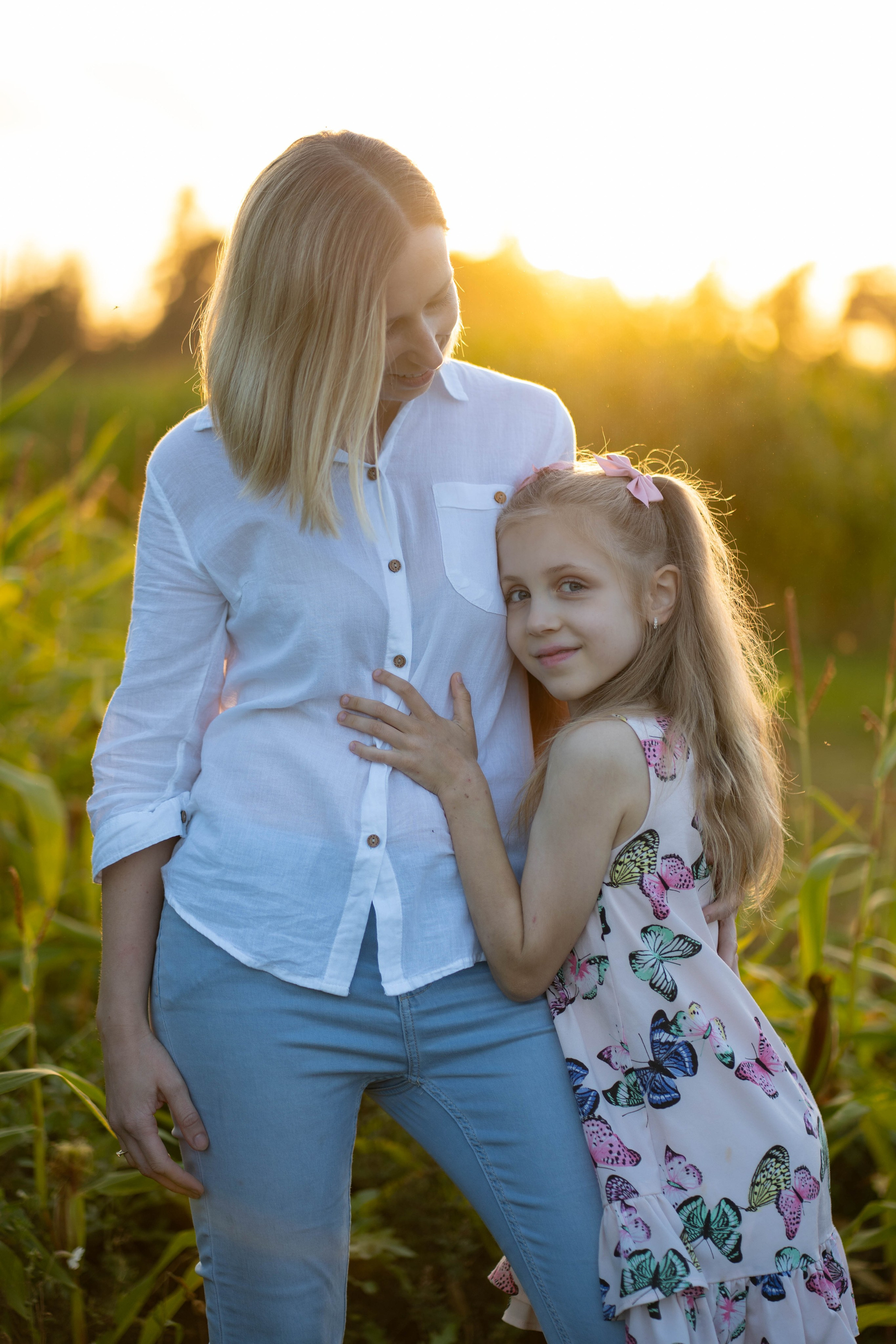 Renata — šeimos fotosesija kukurūzų lauke. Fotografija — Olga Bojarin
