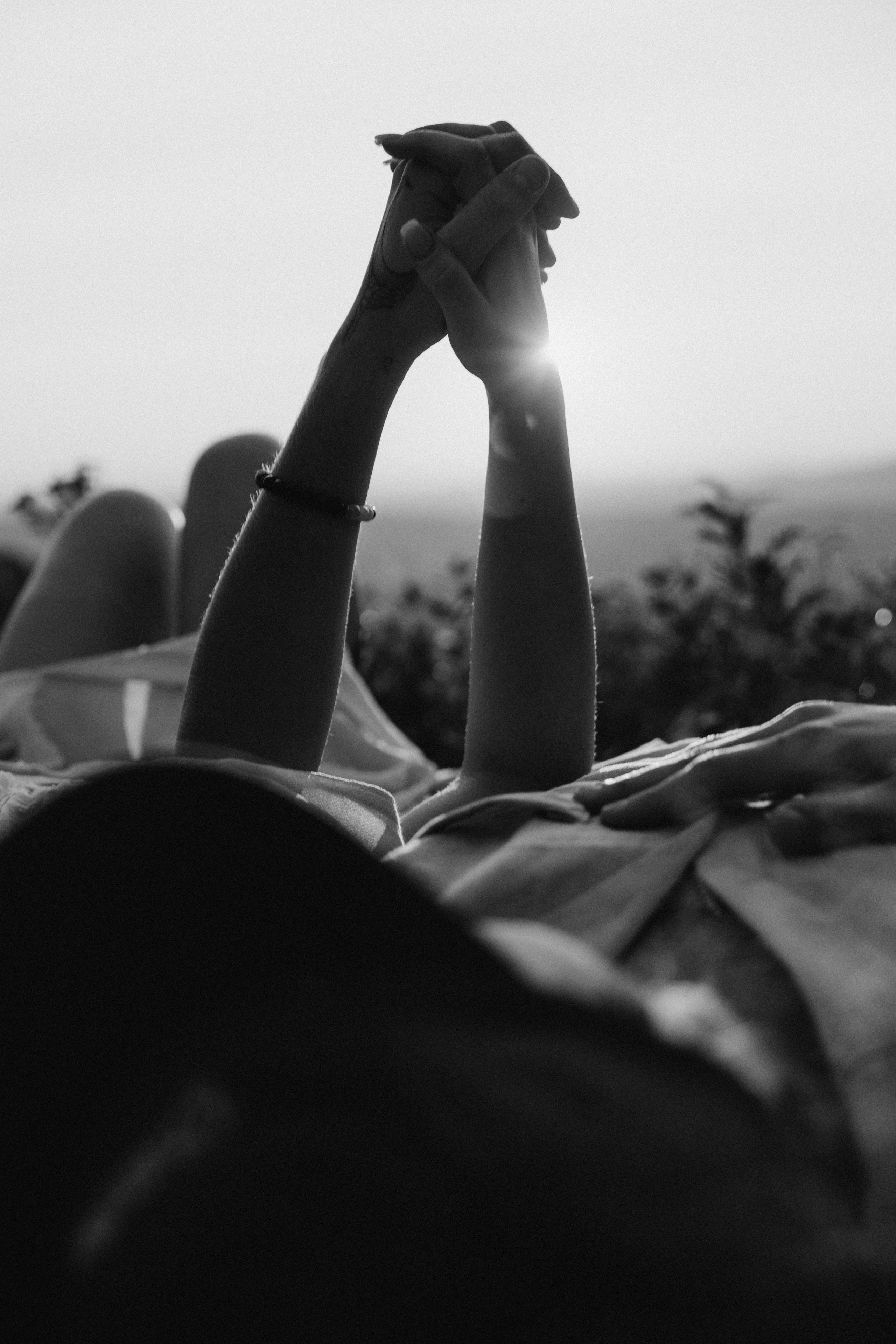 couple holding hands in a sunset light in Upstate New York 
