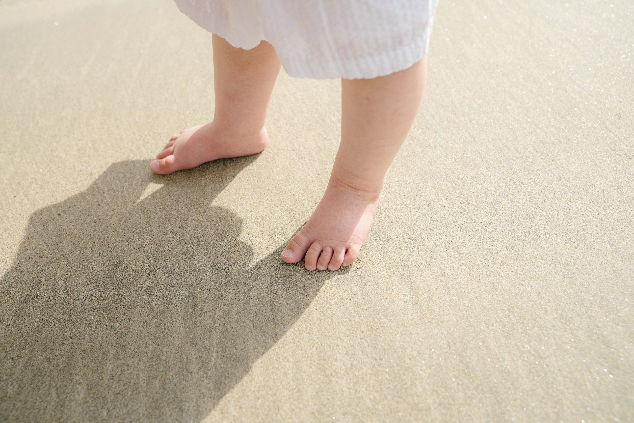 Darya and Mia at the ocean. Wedding and family photographer Ireland