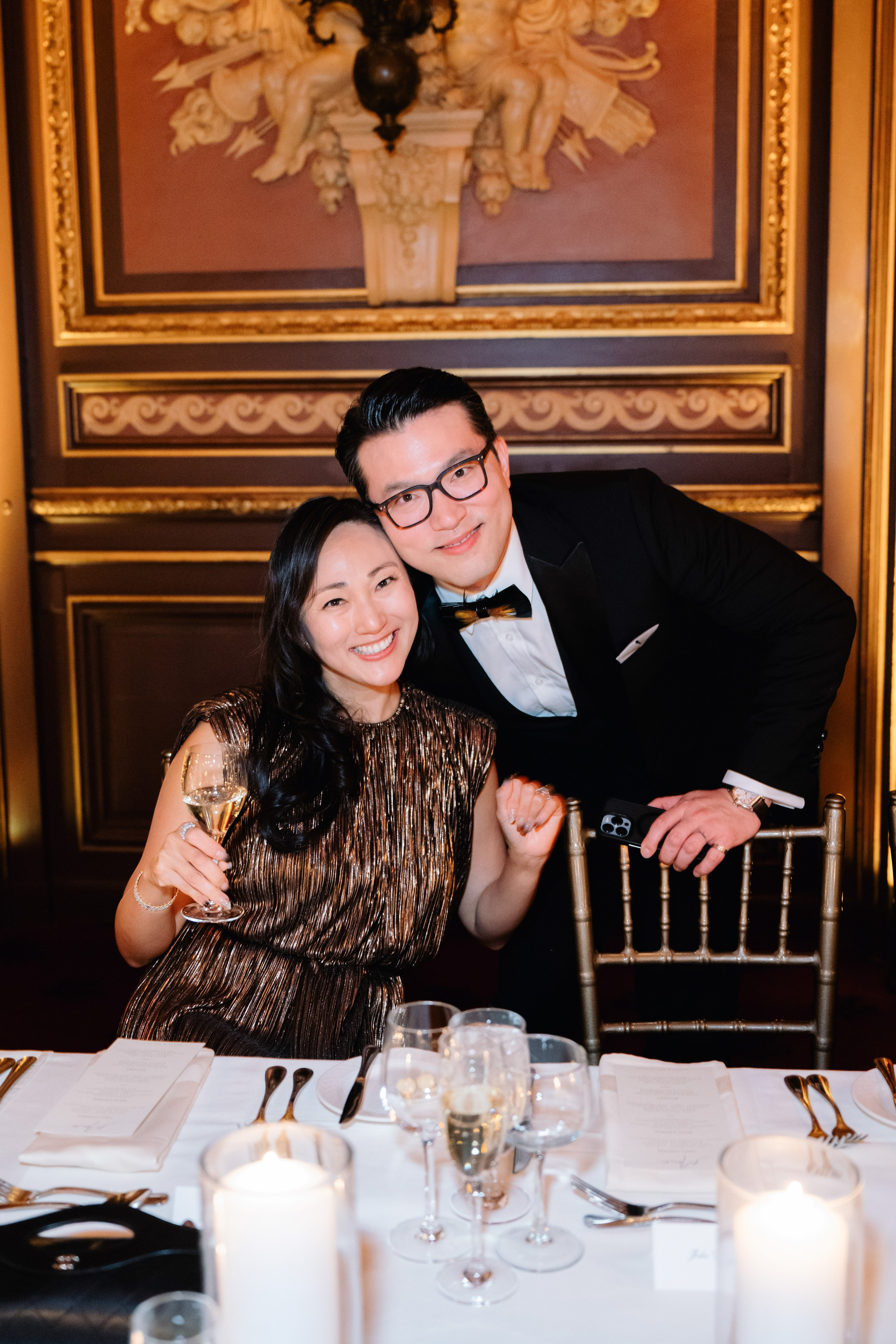 a man and woman sitting at a table