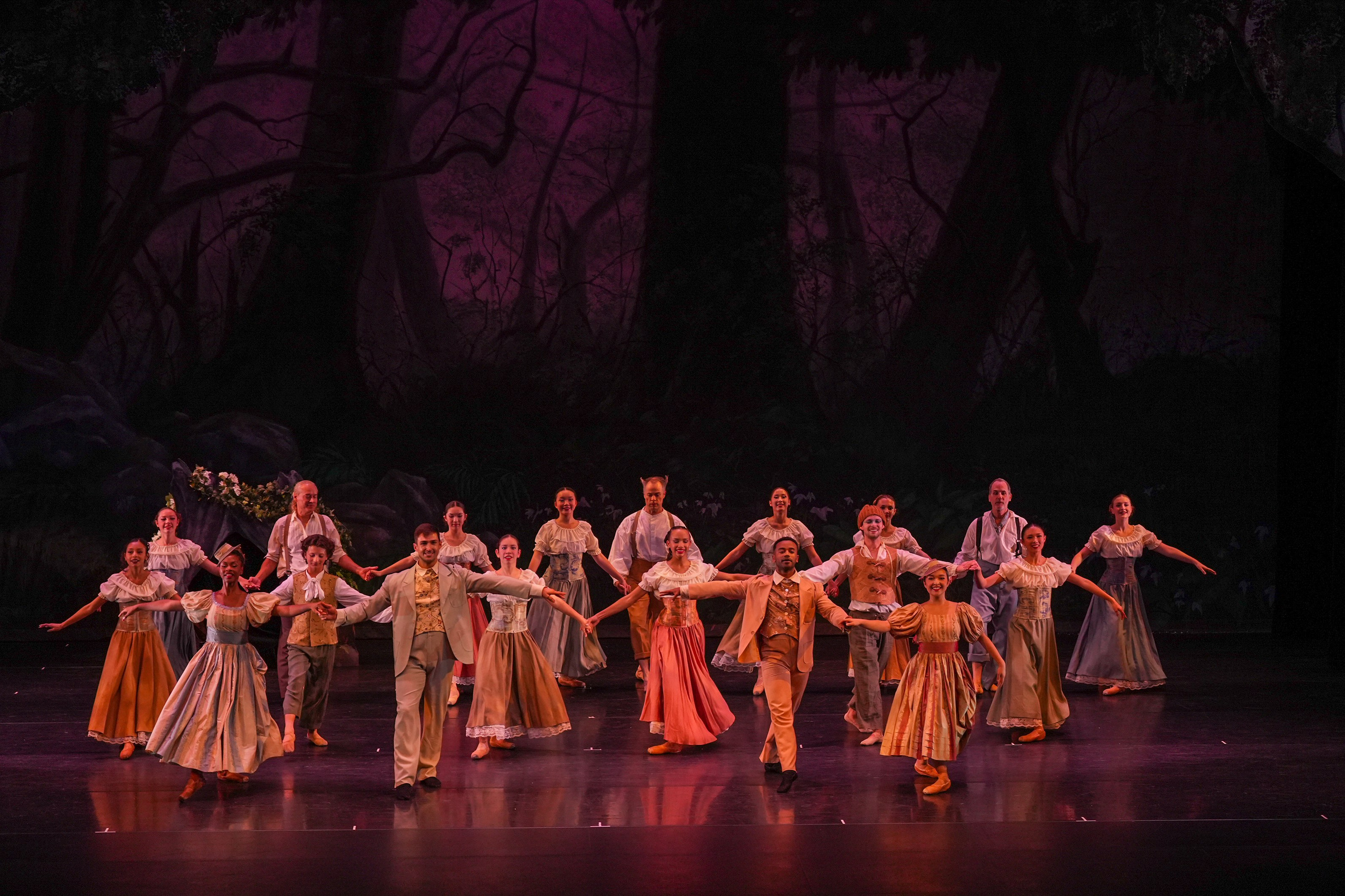 Ballet dancer captured mid-jump during a live performance in Santa Clarita.