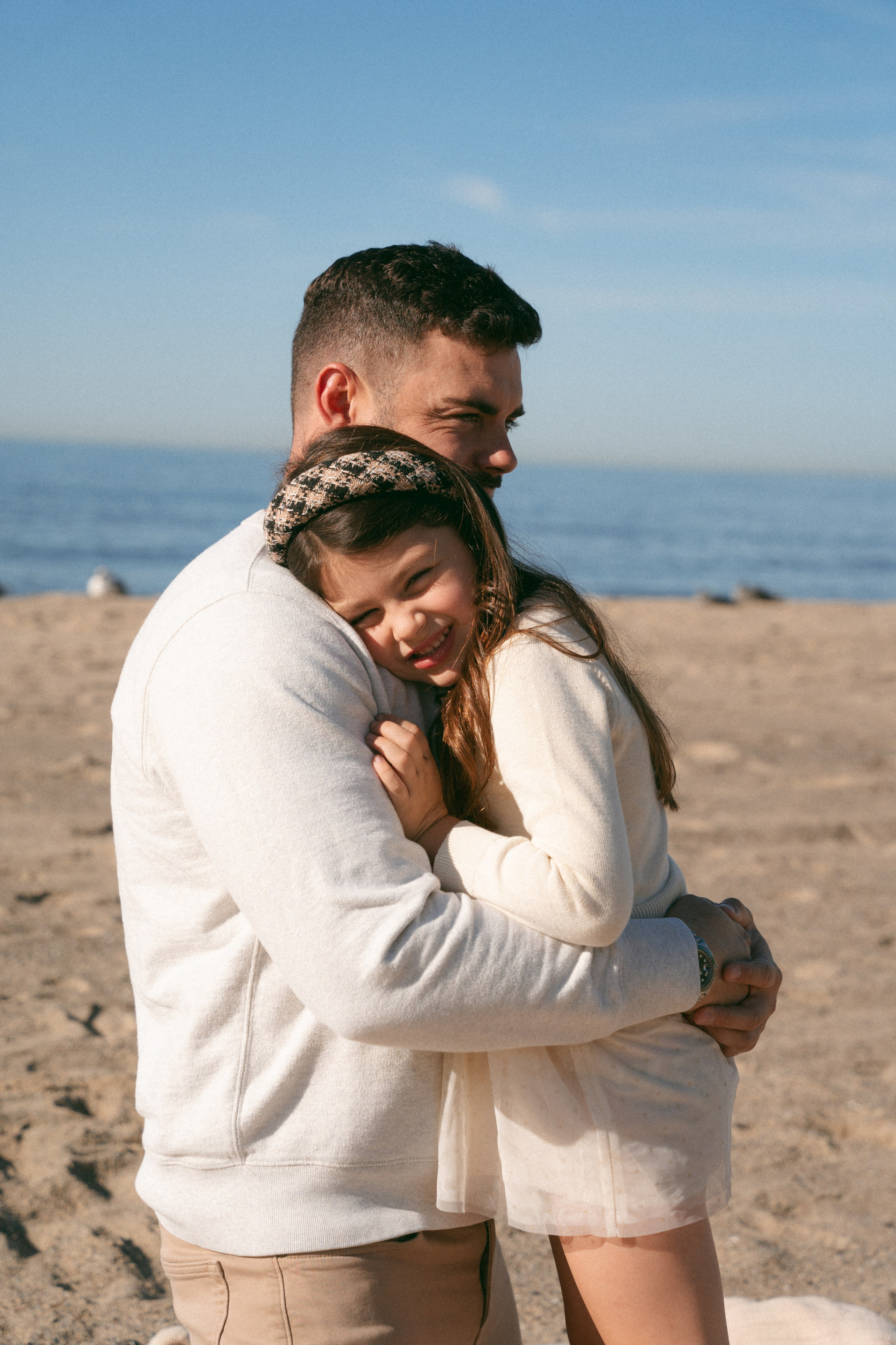 Family photoshoot. Family photoshoot outside. Beach photoshoot. Family holiday photoshoot. Sunset photoshoot