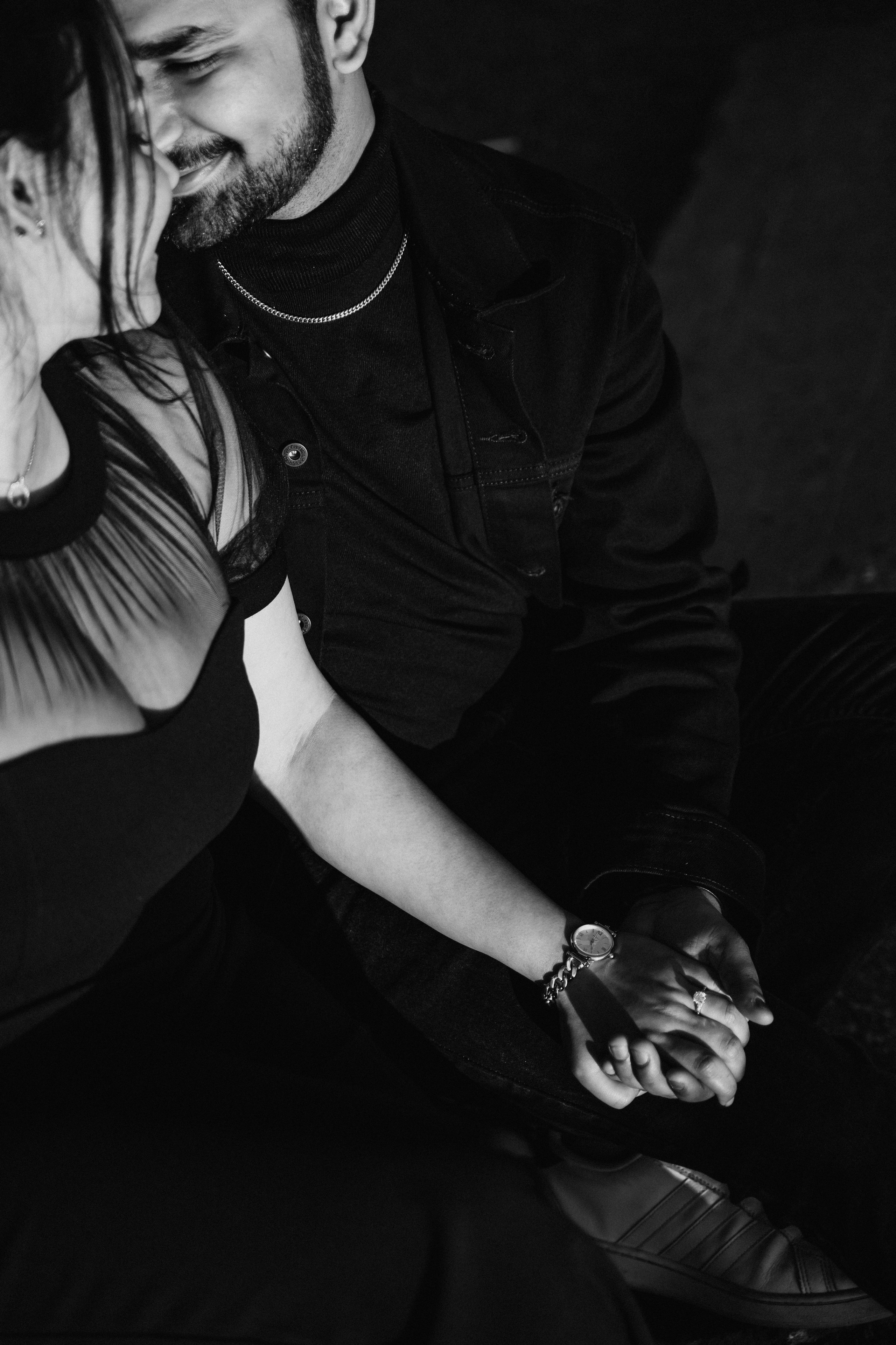 Proposal.  Overlooking the golden San Franisco Bridge sunset with a couple. Photographer Video. 