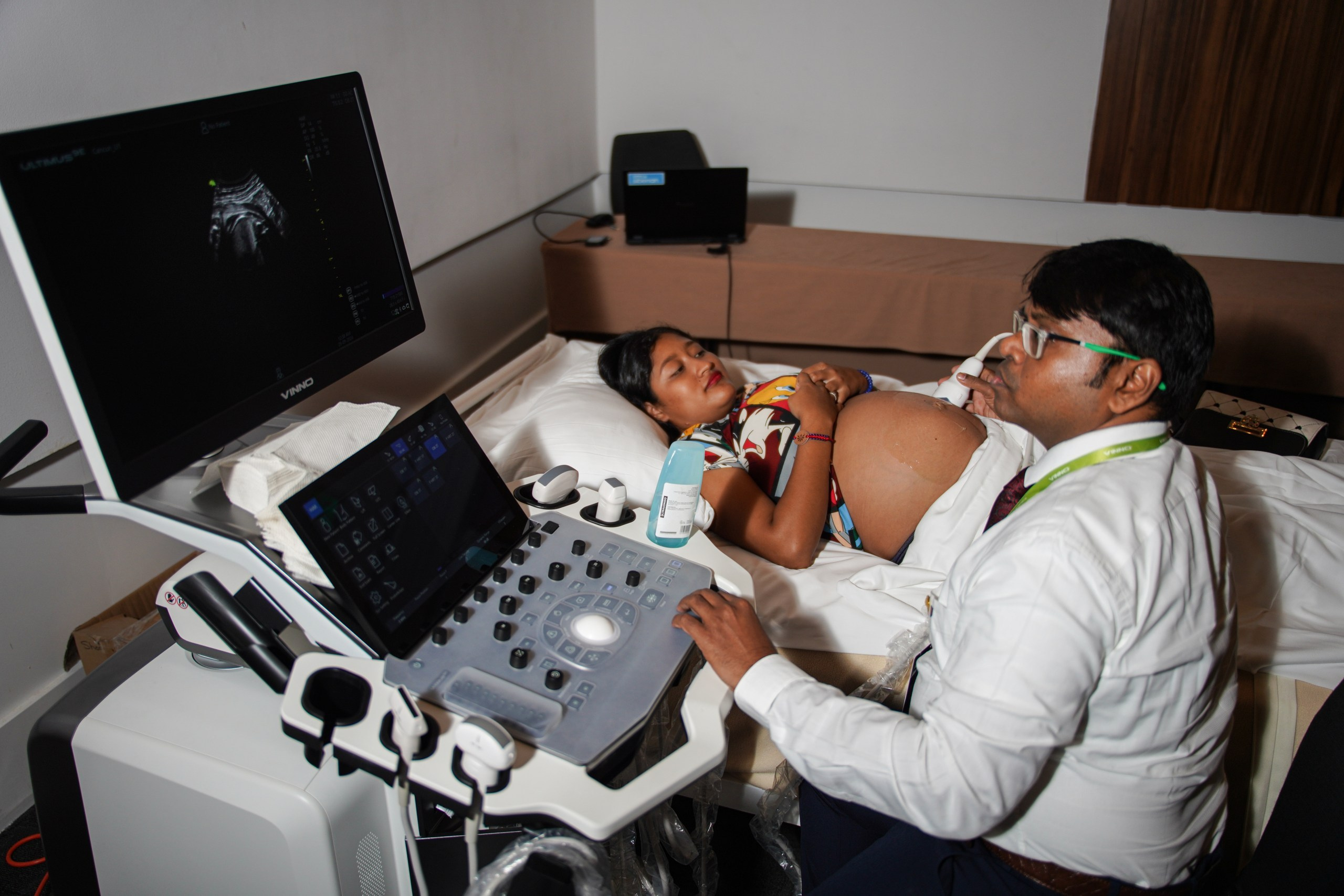 Presenter revealing new product features during medical equipment launch.