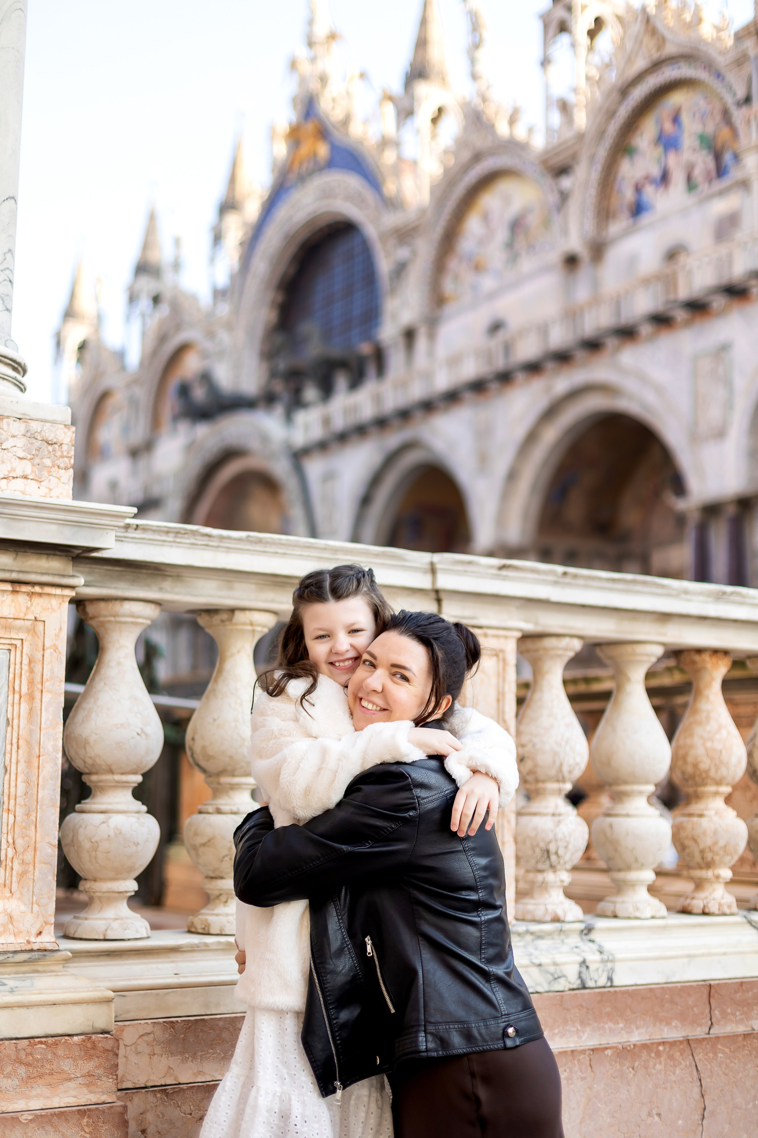 Mother and daughter at sunrise