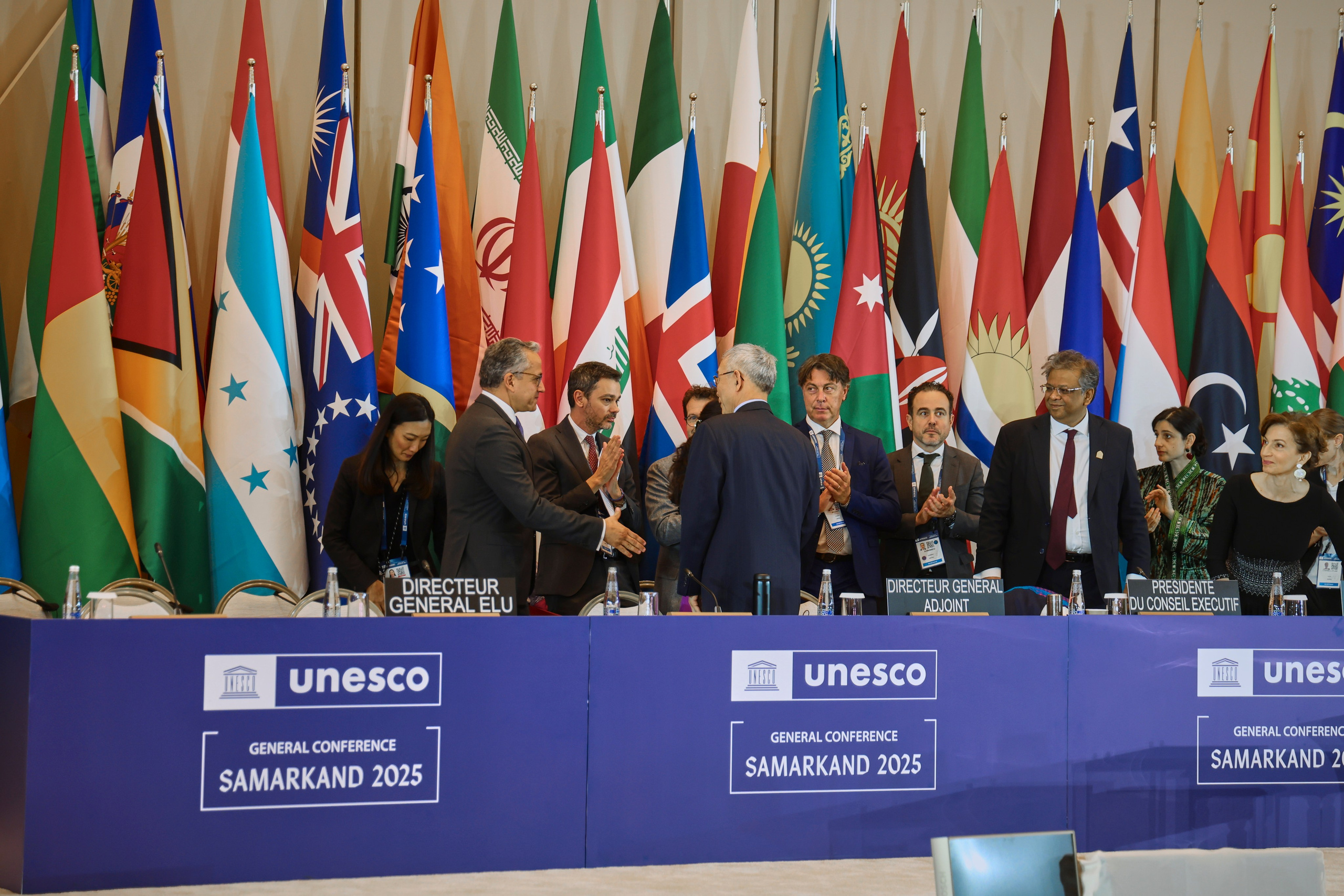 Delegates networking at UNESCO General Conference in Samarkand — reportage photography