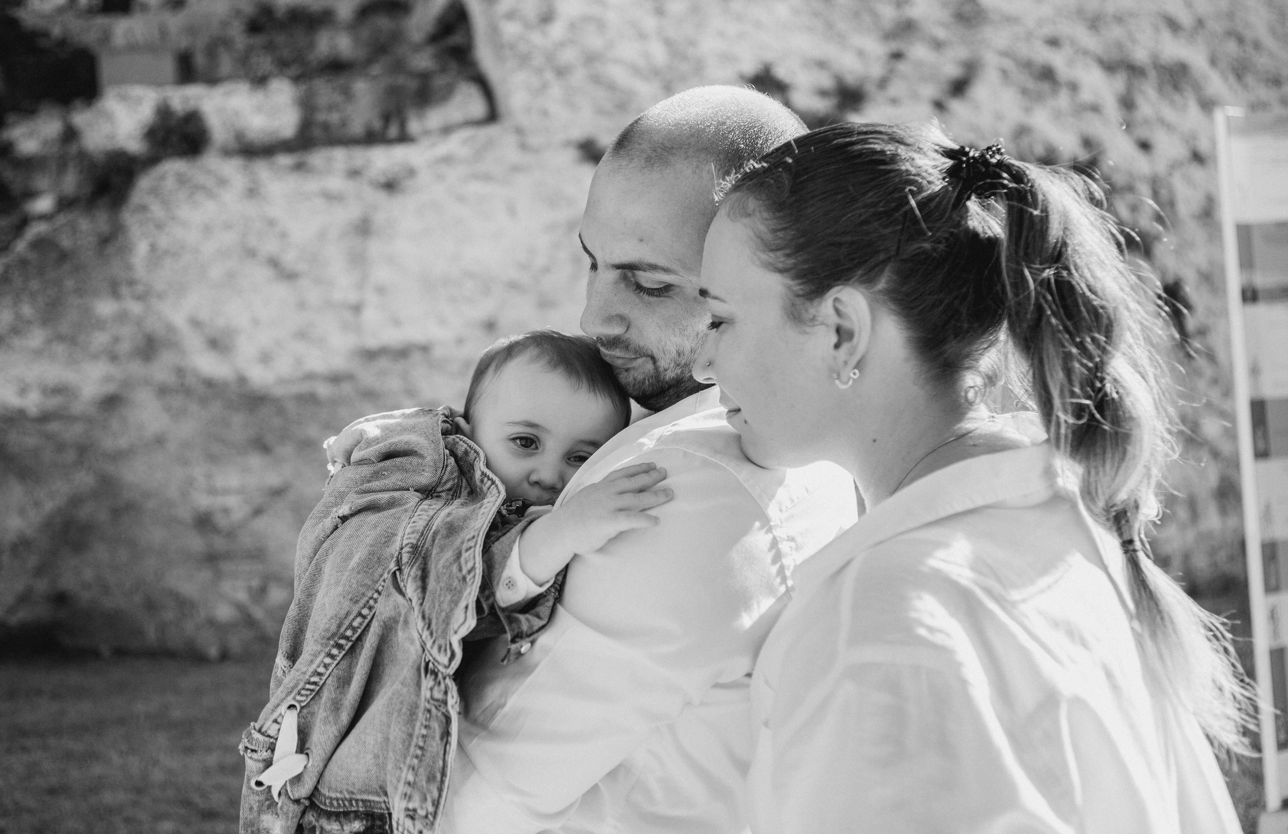 AT THE WALLS OF THE OLD CITY. PHOTOGRAPHER IN ISRAEL