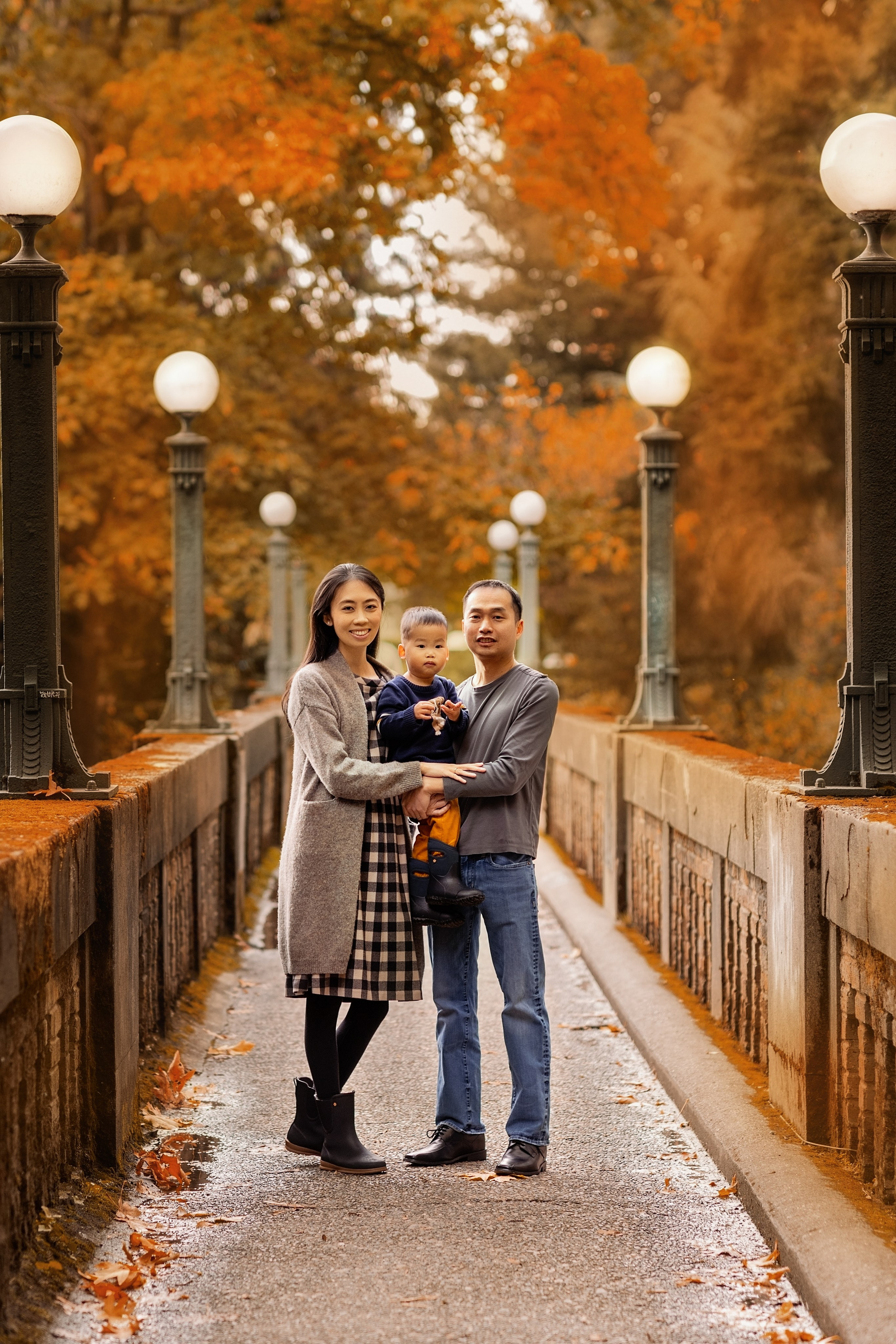 Cathy & Arthur with Marvel son. Wedding & family photography in Seattle area. Helen Michelle photographer