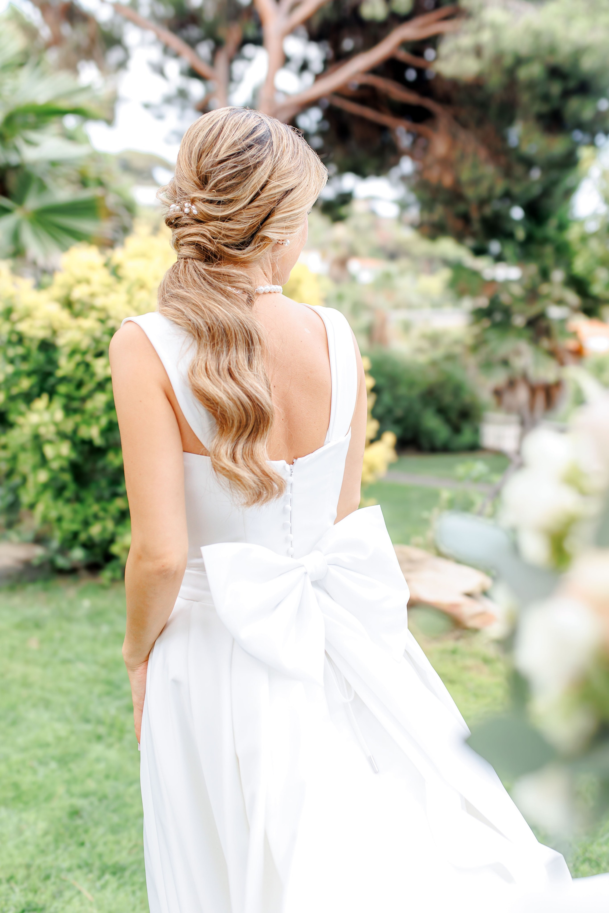 Stylish wedding dress with a bow on the back
