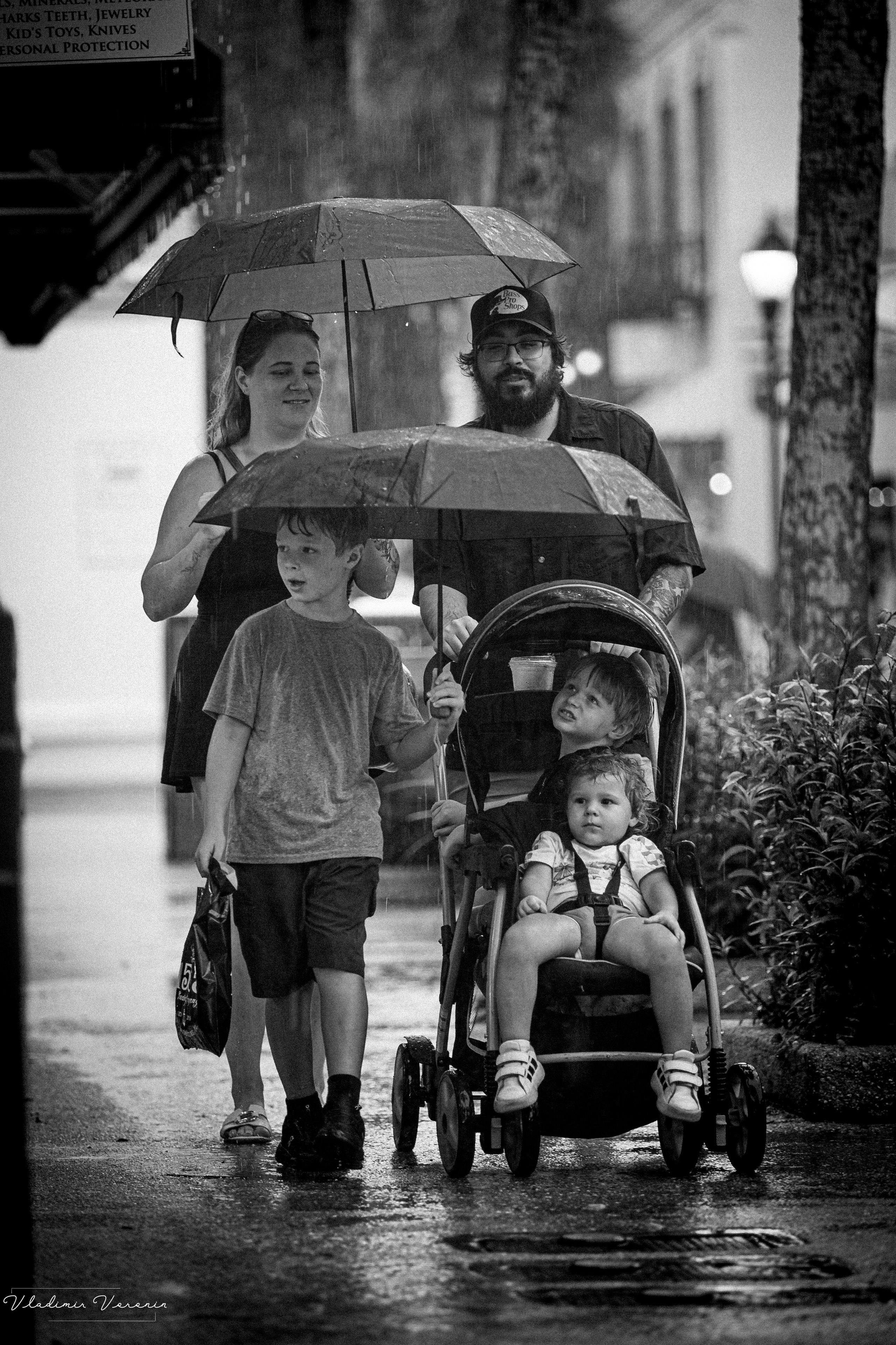 Rain in downtown. Family Portrait Photography in St. Augustine | Vladimir Voronin and Son