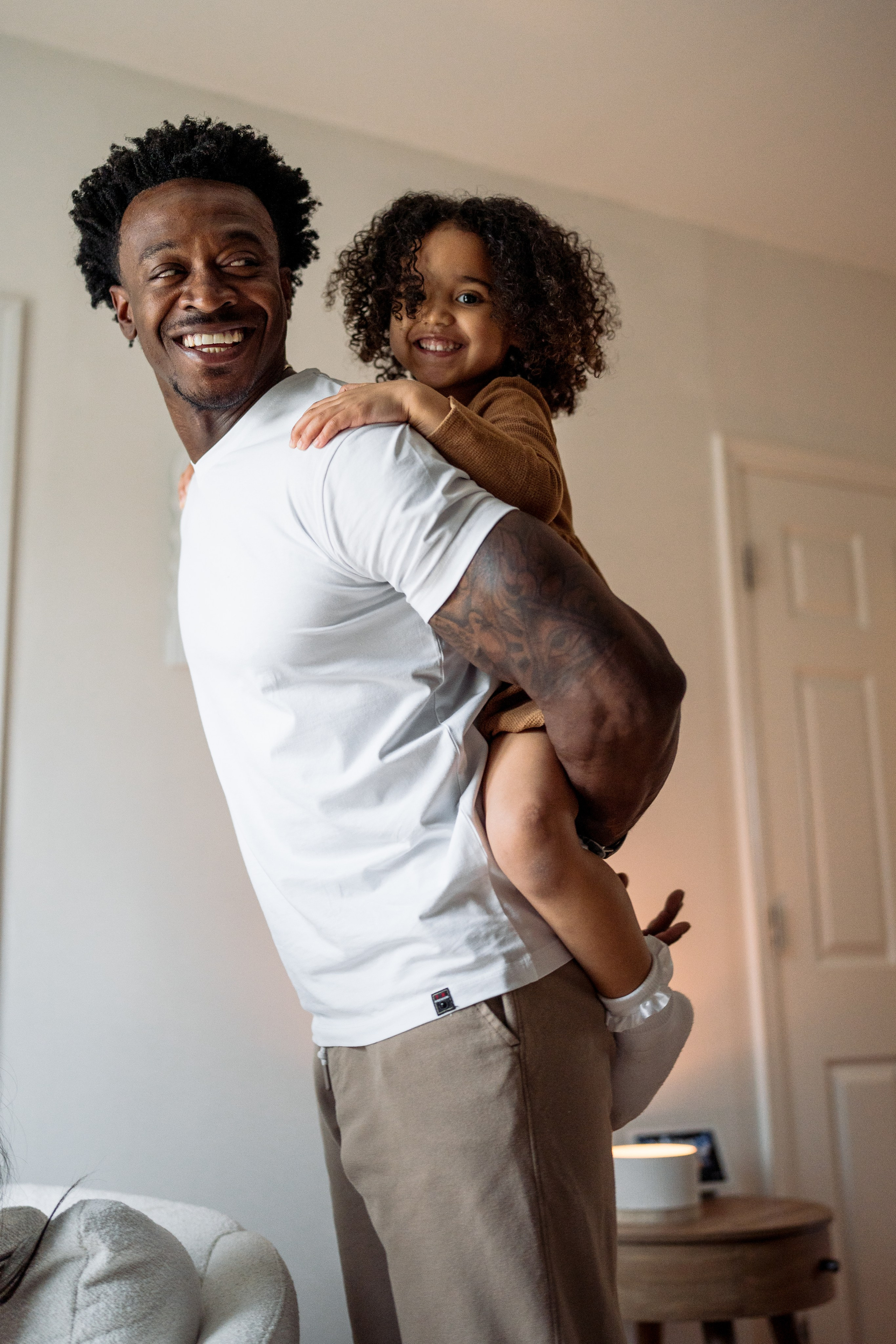 Stephanie, Lamar and kids at home. Wedding and family photographer and videographer PA, NJ, NY, DE, MD