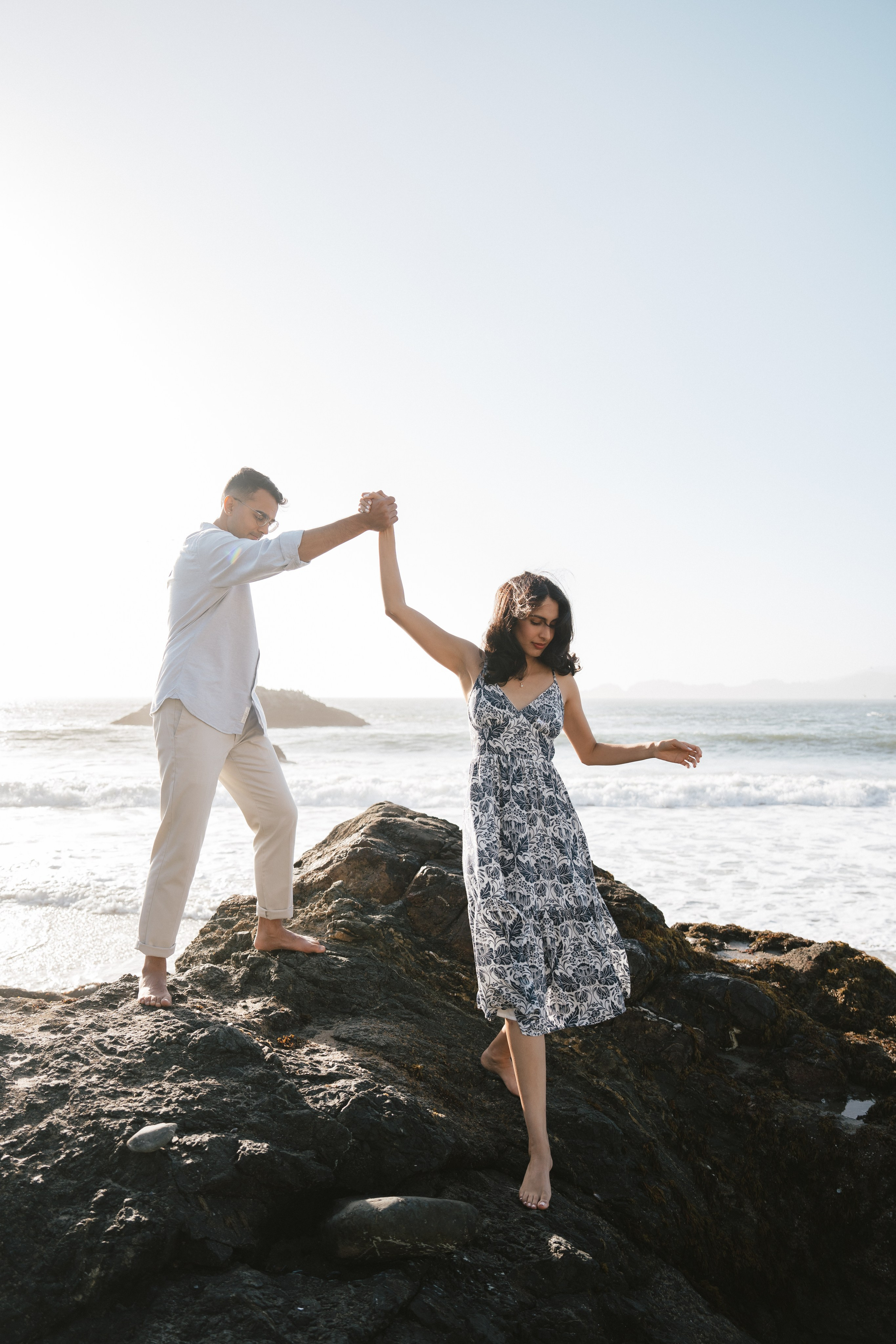 Engagement and Couple’s Photoshoot at Marshall’s Beach with iconic Golden Gate bridge view. Soulo Photography | San Francisco Bay Area Based Photographer