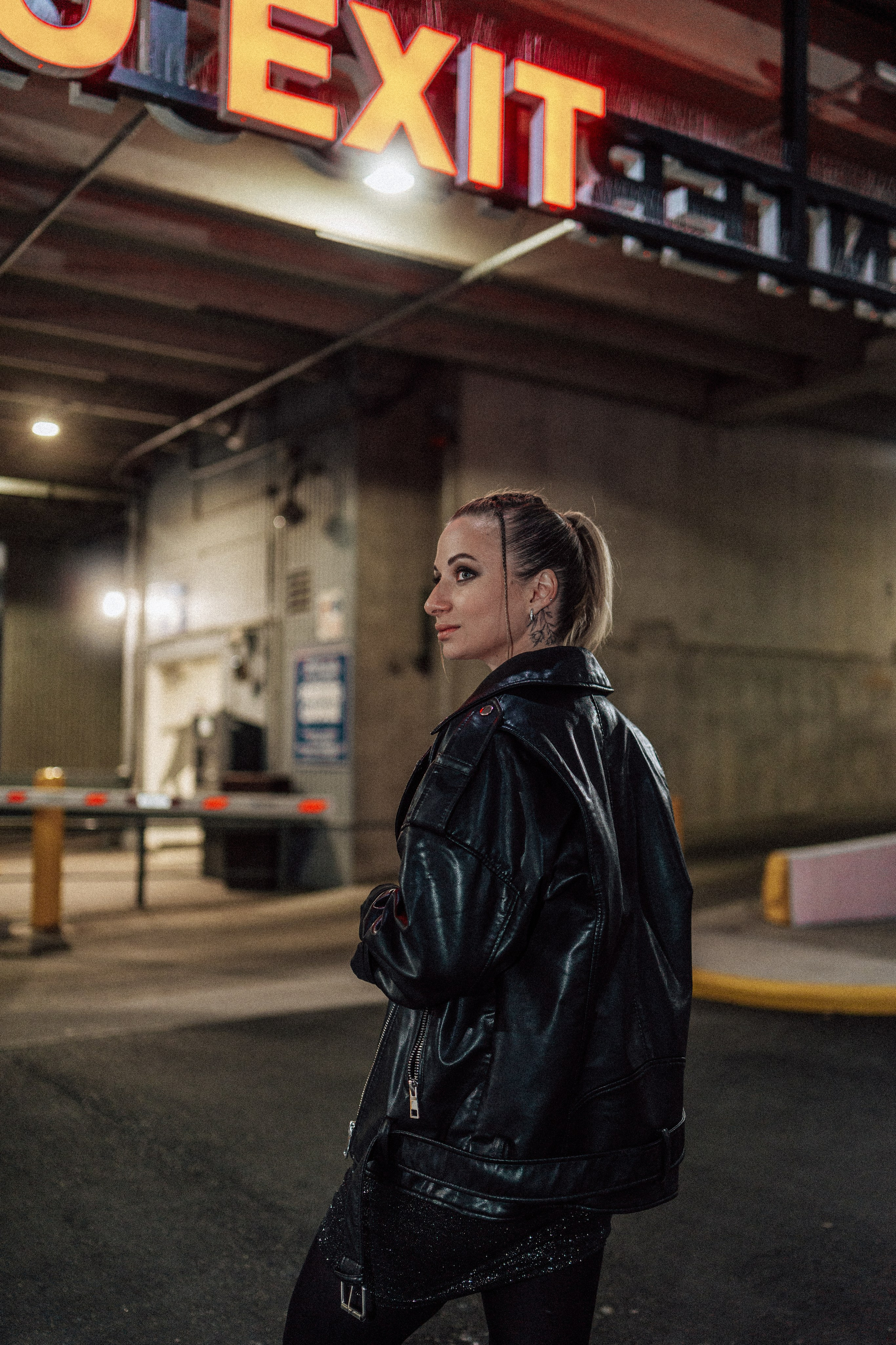 Dynamic parking lot photoshoot in Windsor, Ontario, focusing on creative portrait photography for a modern look.