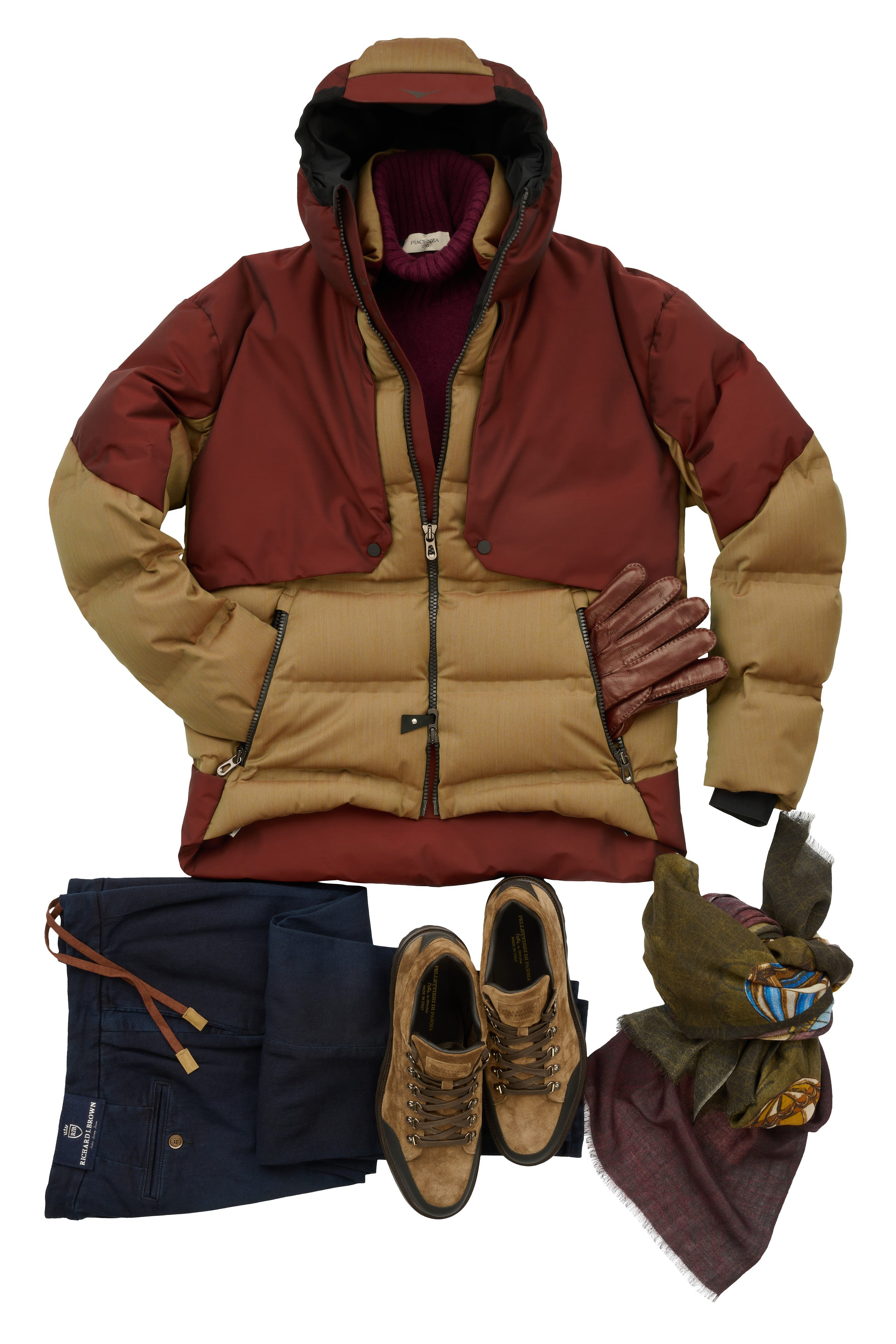 Produktfotografie Wien – Outfit-Komposition mit Jacke, Hose, Schuhen und Schal.