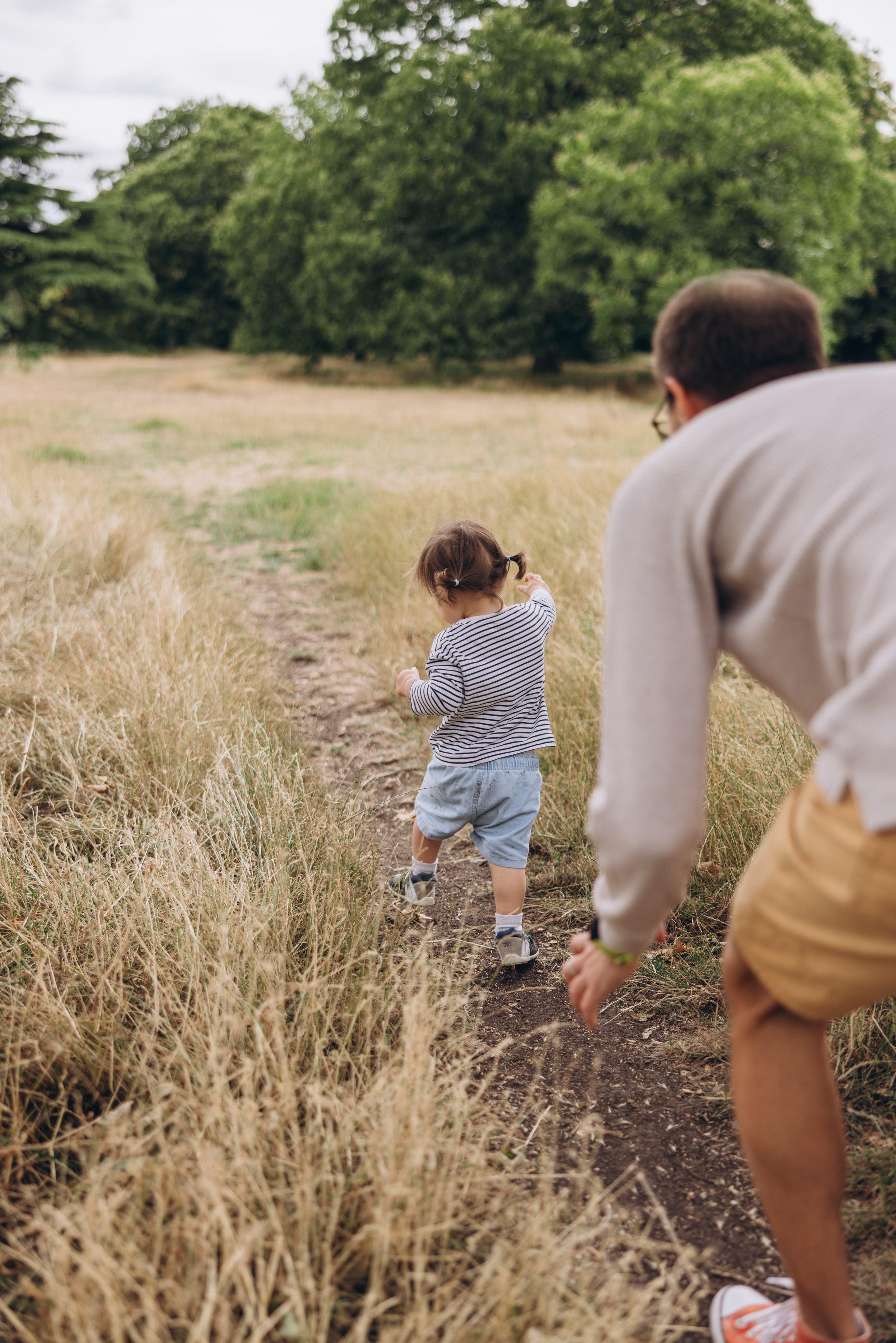 Milena with parents (Greenwich Park). Anastasia Klink, Photographer in London