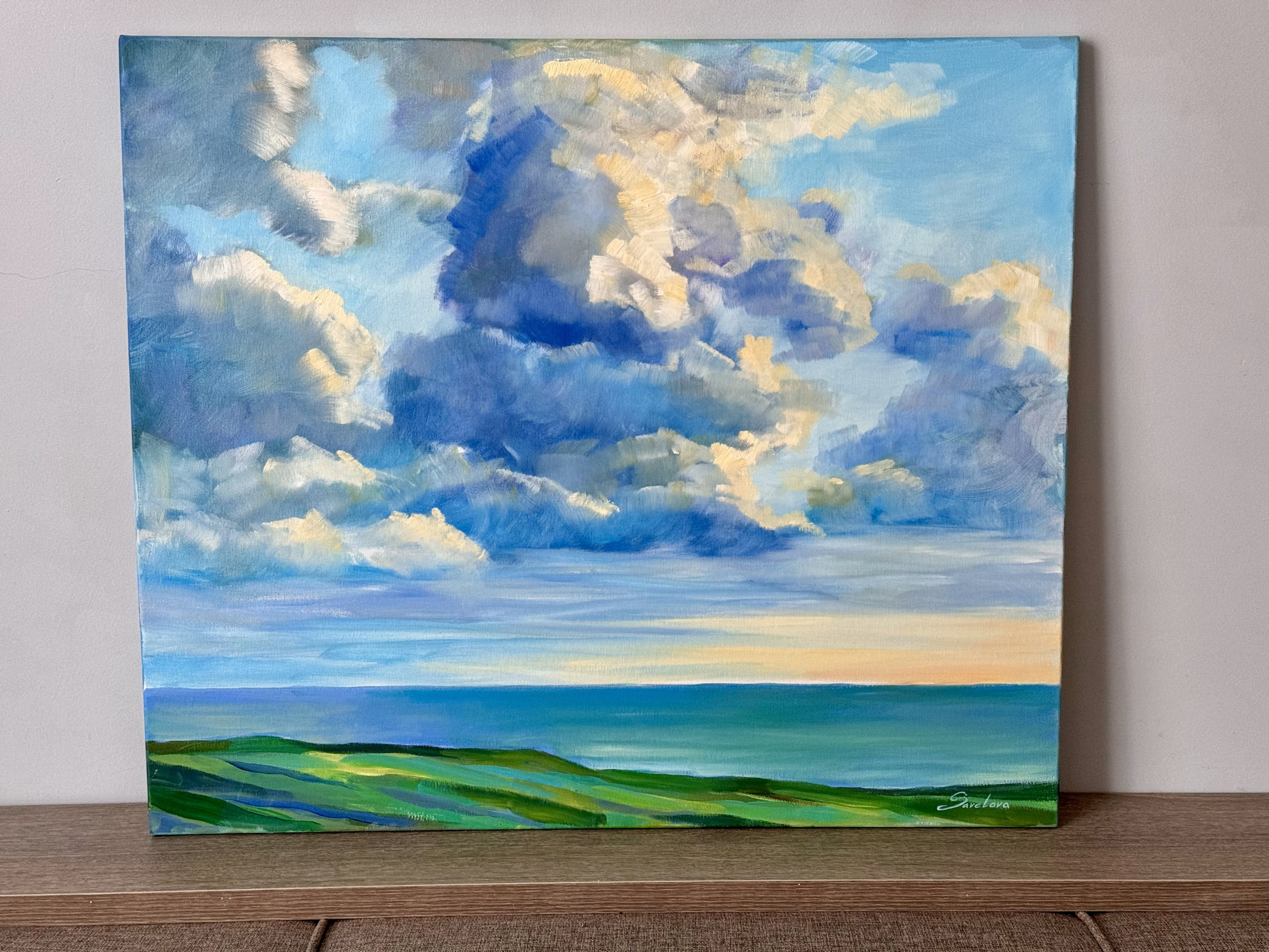 «Fluffy clouds above a sea». Художник живописец Савелова Ольга