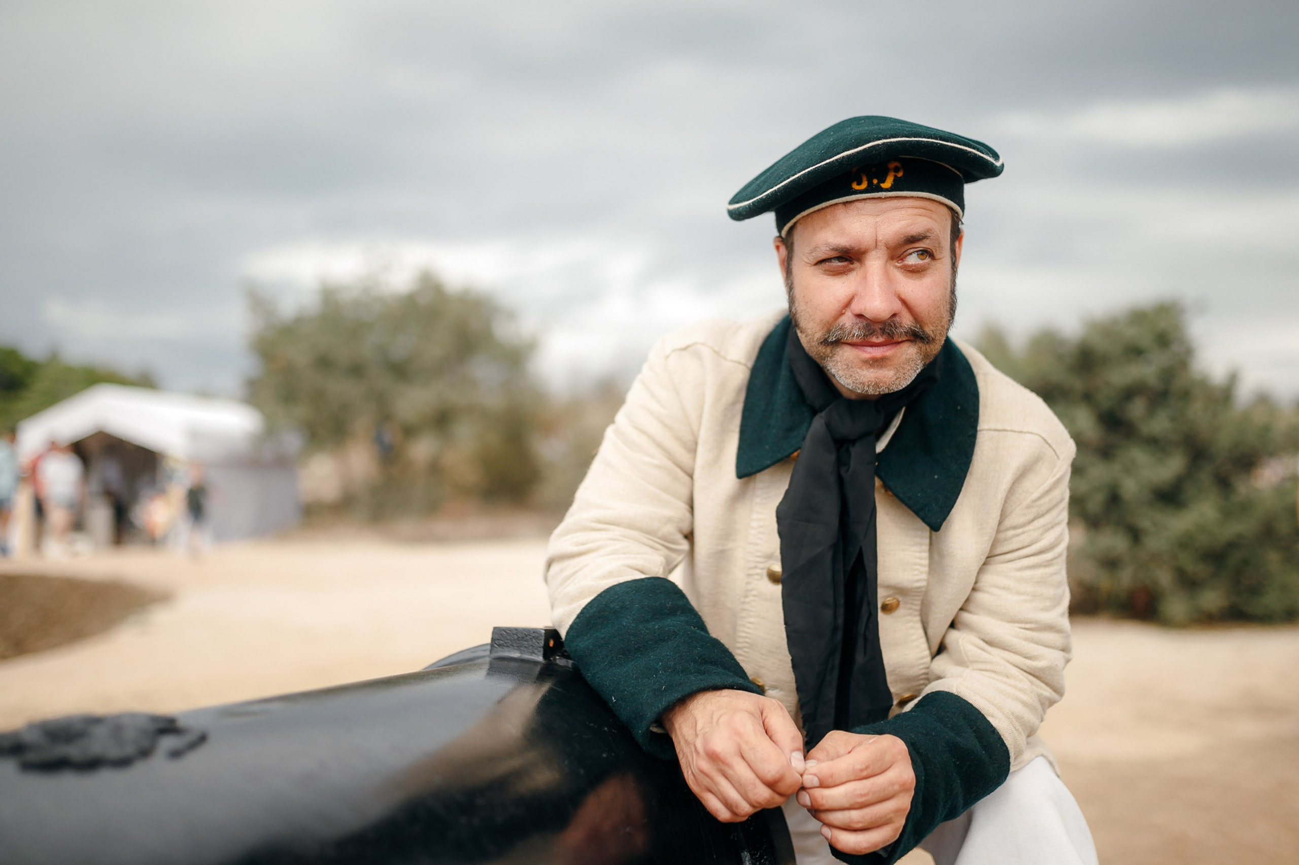 Man in historical military uniform smiling