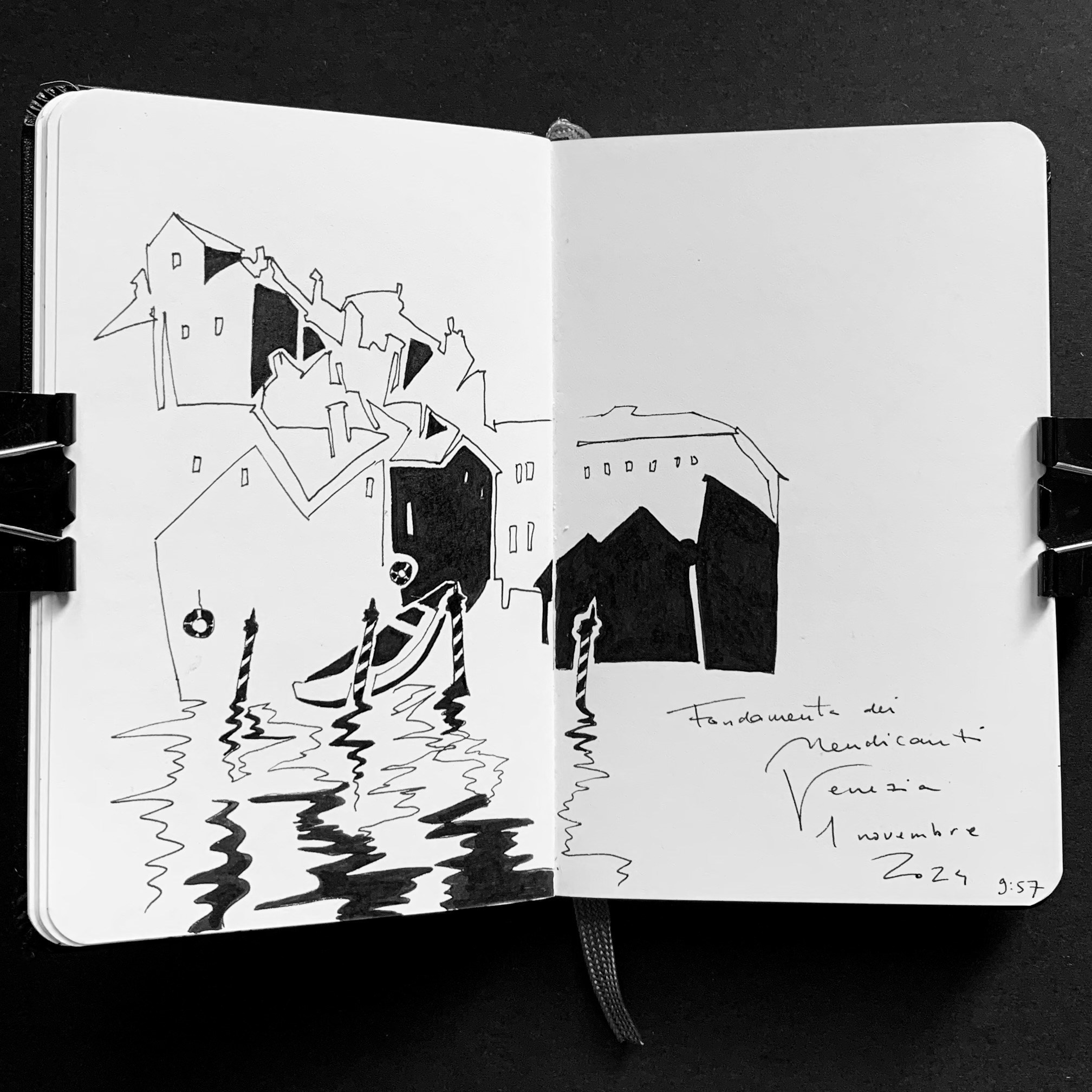 Moleskine notebook with hand-drawn sketches made in Venice, serving as an artist’s visual diary and personal testimony within a contemporary practice. A contrast black and white drawing of a Venetian house and reflection in water.