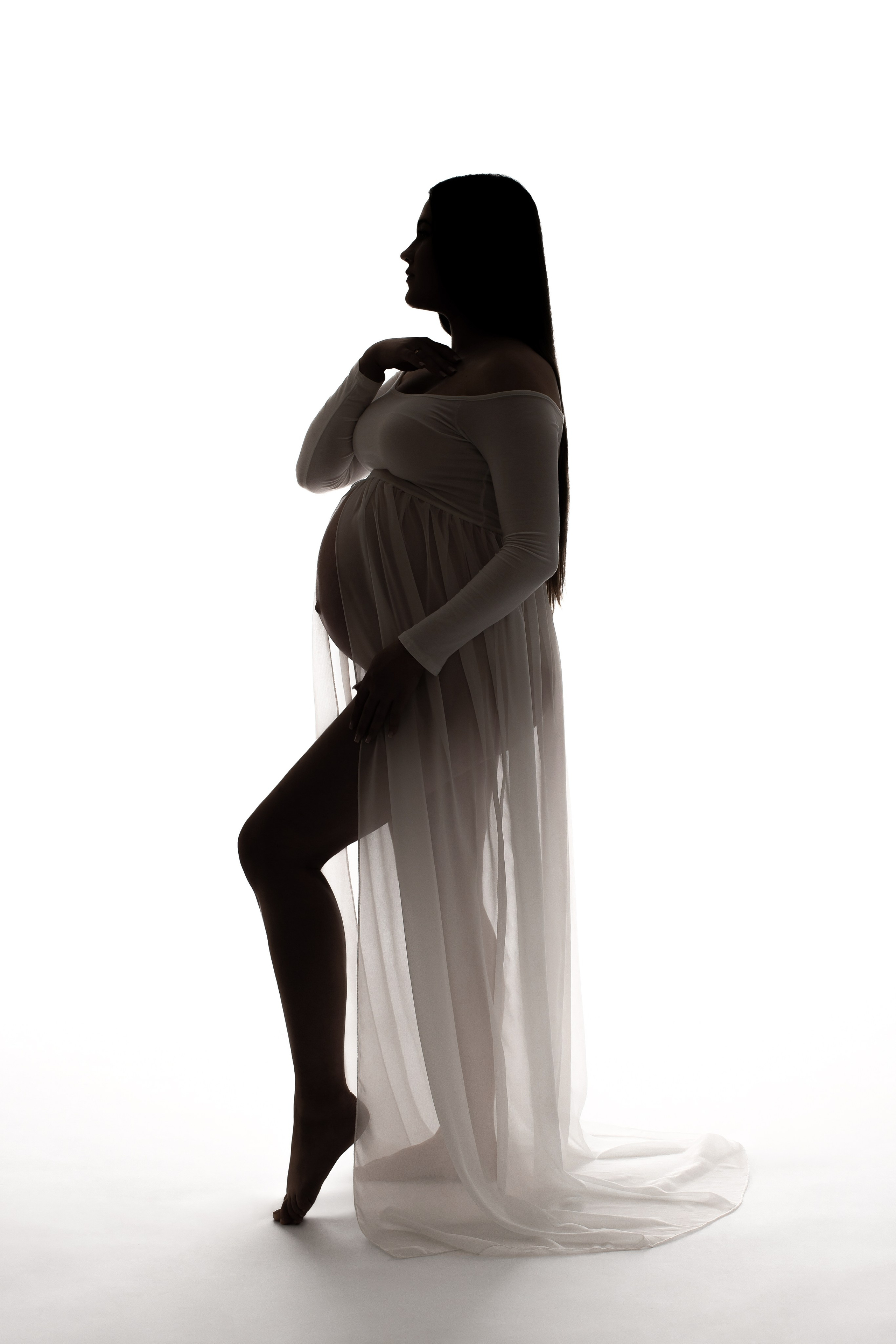 Studiofotografie, Schwangerschaft, Schwangerschaftsshooting, Fotoshooting Babybauch, Babybauchshooting, Osnabrück, Porträt, minimalistisch, schwarz-weiß, Osnabrueck, Fotograf Osnabrück, Fotografin Osnabrück