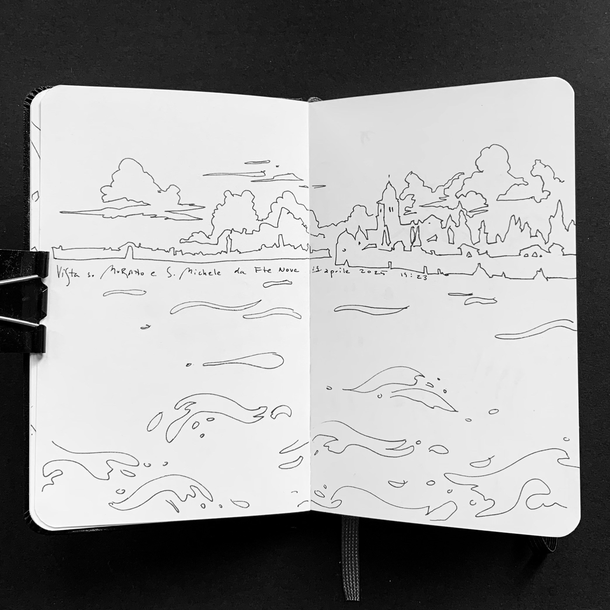 Moleskine notebook with hand-drawn sketches made in Venice, serving as an artist’s visual diary and personal testimony within a contemporary practice. An island of San Michele across the waves, drawing.