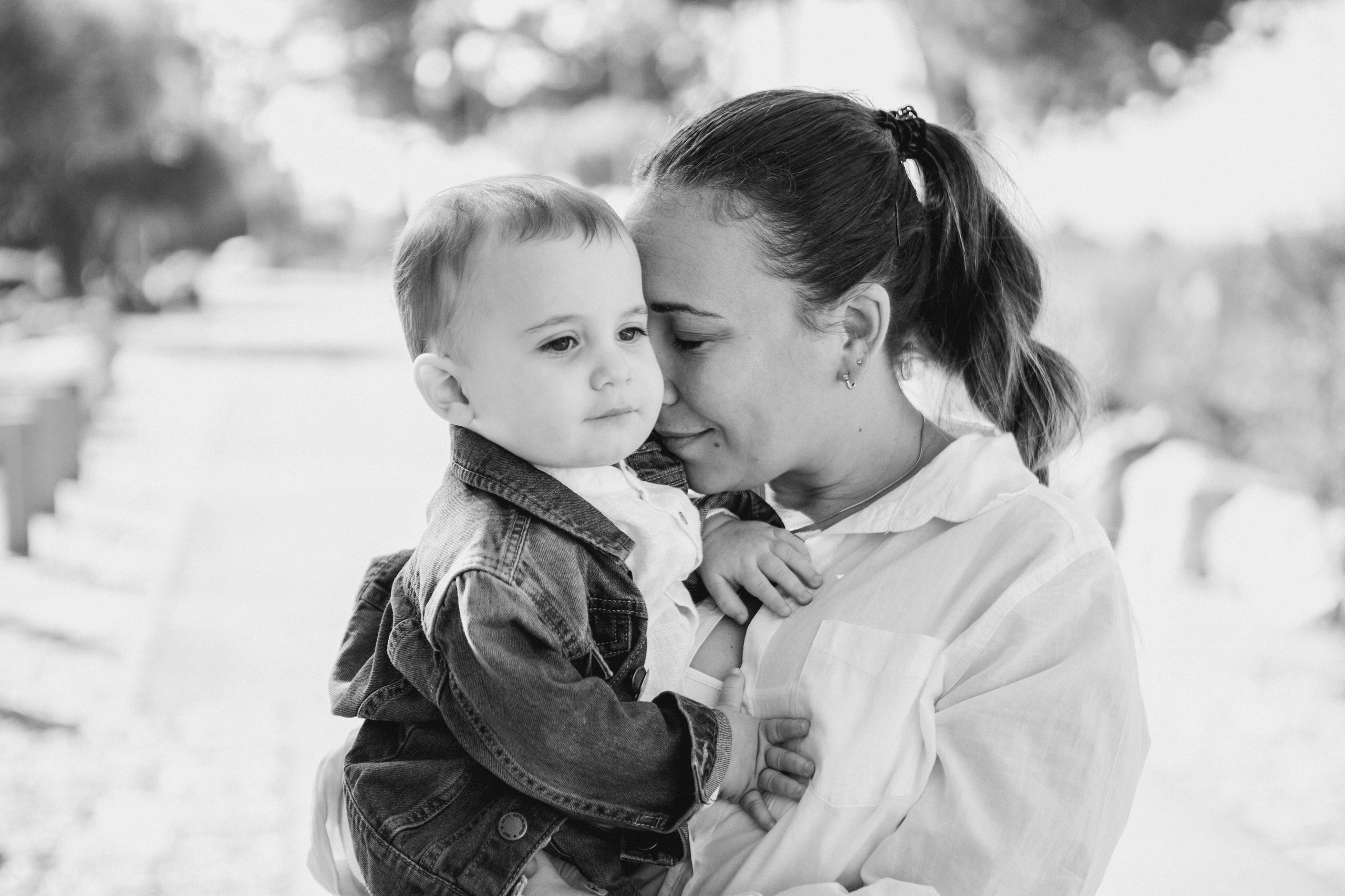 AT THE WALLS OF THE OLD CITY. PHOTOGRAPHER IN ISRAEL