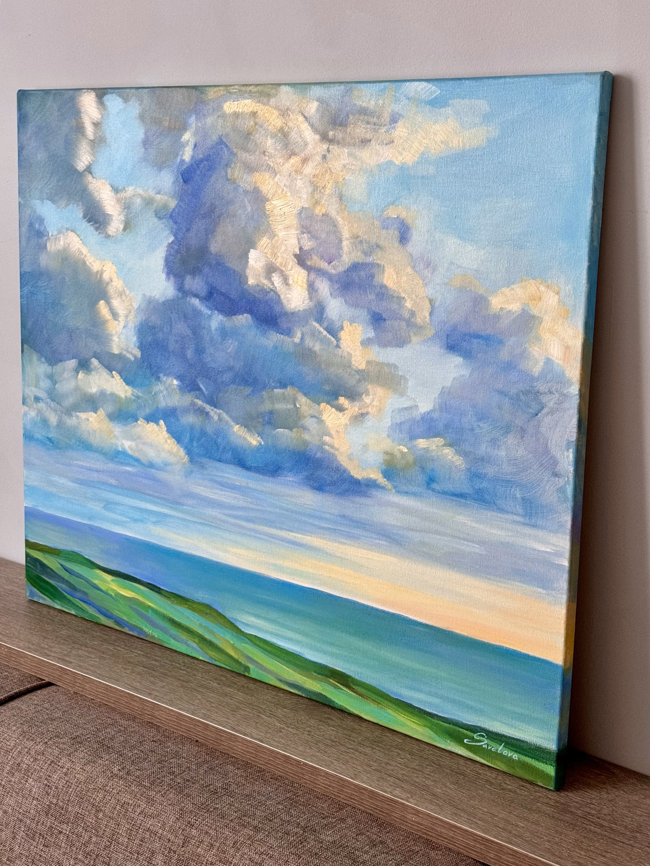 «Fluffy clouds above a sea». Художник живописец Савелова Ольга