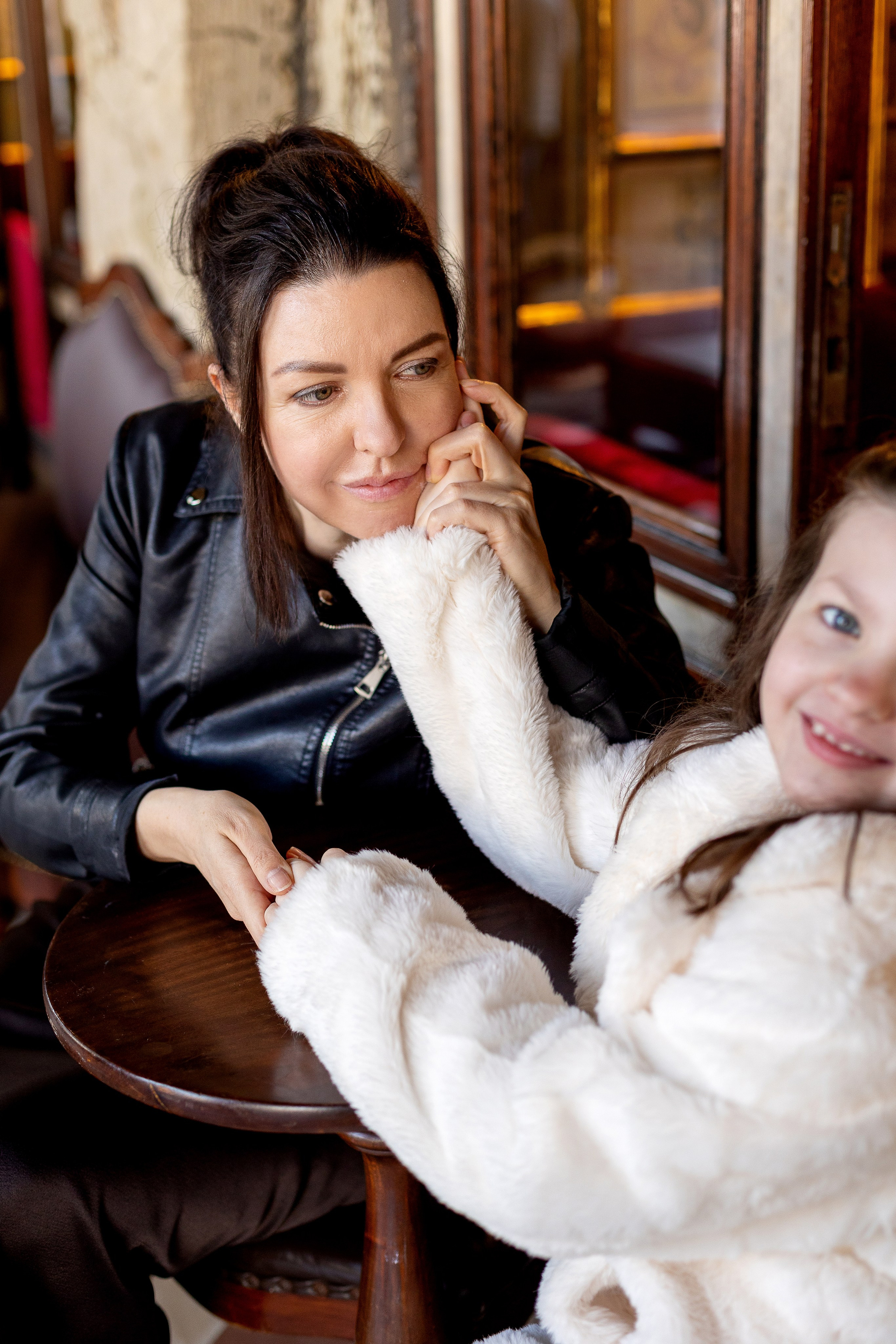 Mother and daughter at sunrise