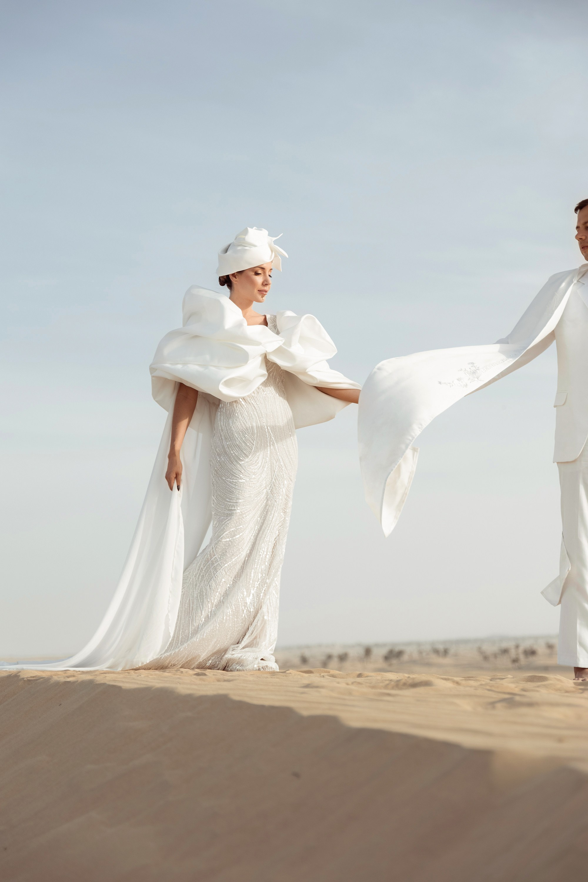 Bride is holding a groom's hand. Dubai, United Arab Emirates