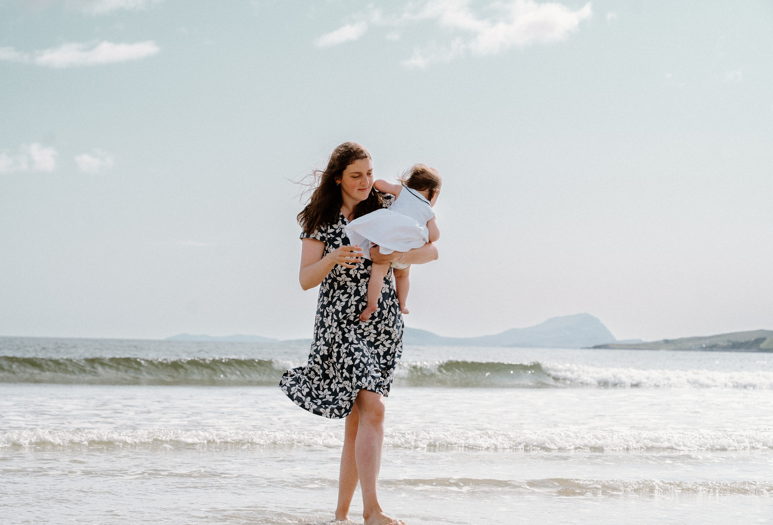 Darya and Mia at the ocean. Wedding and family photographer Ireland