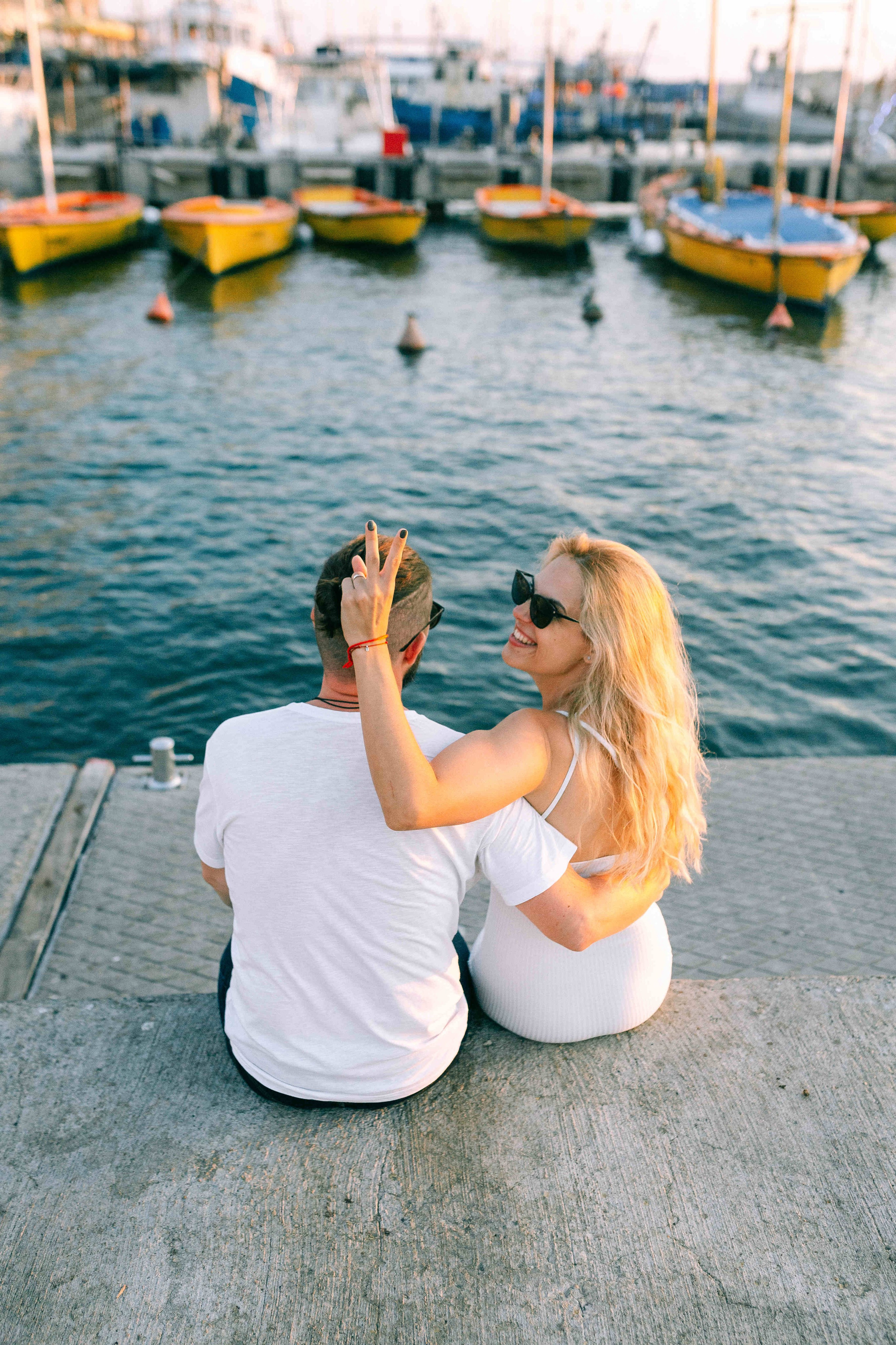 SUNSET IN JAFFO PORT. PHOTOGRAPHER IN ISRAEL