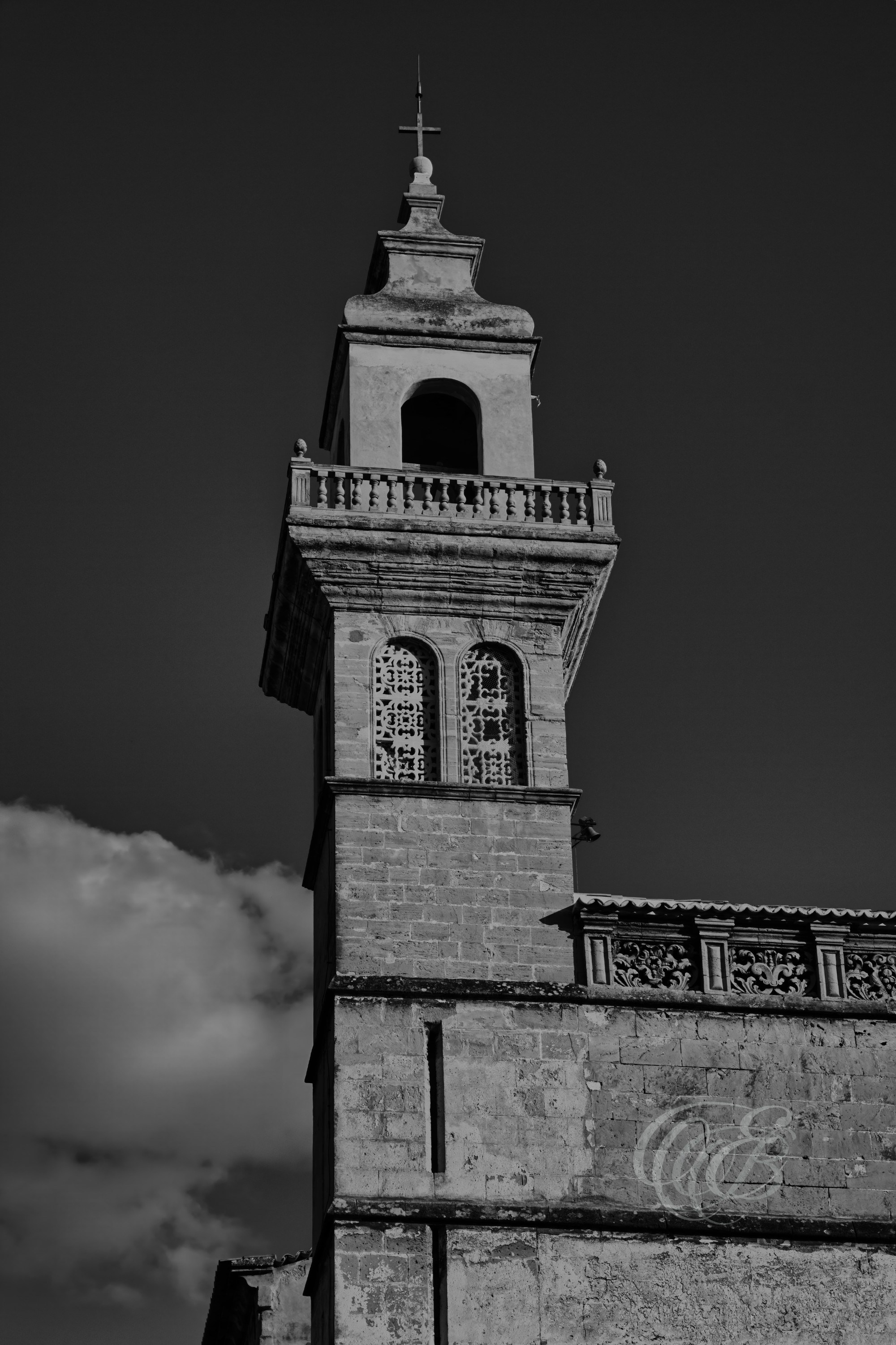 The Convent of Santa Clara has been part of Palma’s historic landscape since the 13th century, reflecting centuries of religious and architectural heritage within the old city. Founded during the medieval period, the convent remains connected to Mallorca’s cultural history and the quieter character preserved within its historic streets. The Black and White presentation emphasizes form, texture, and atmosphere, offering a timeless interpretation of this historic setting. Eduardo Bartoli Photography.