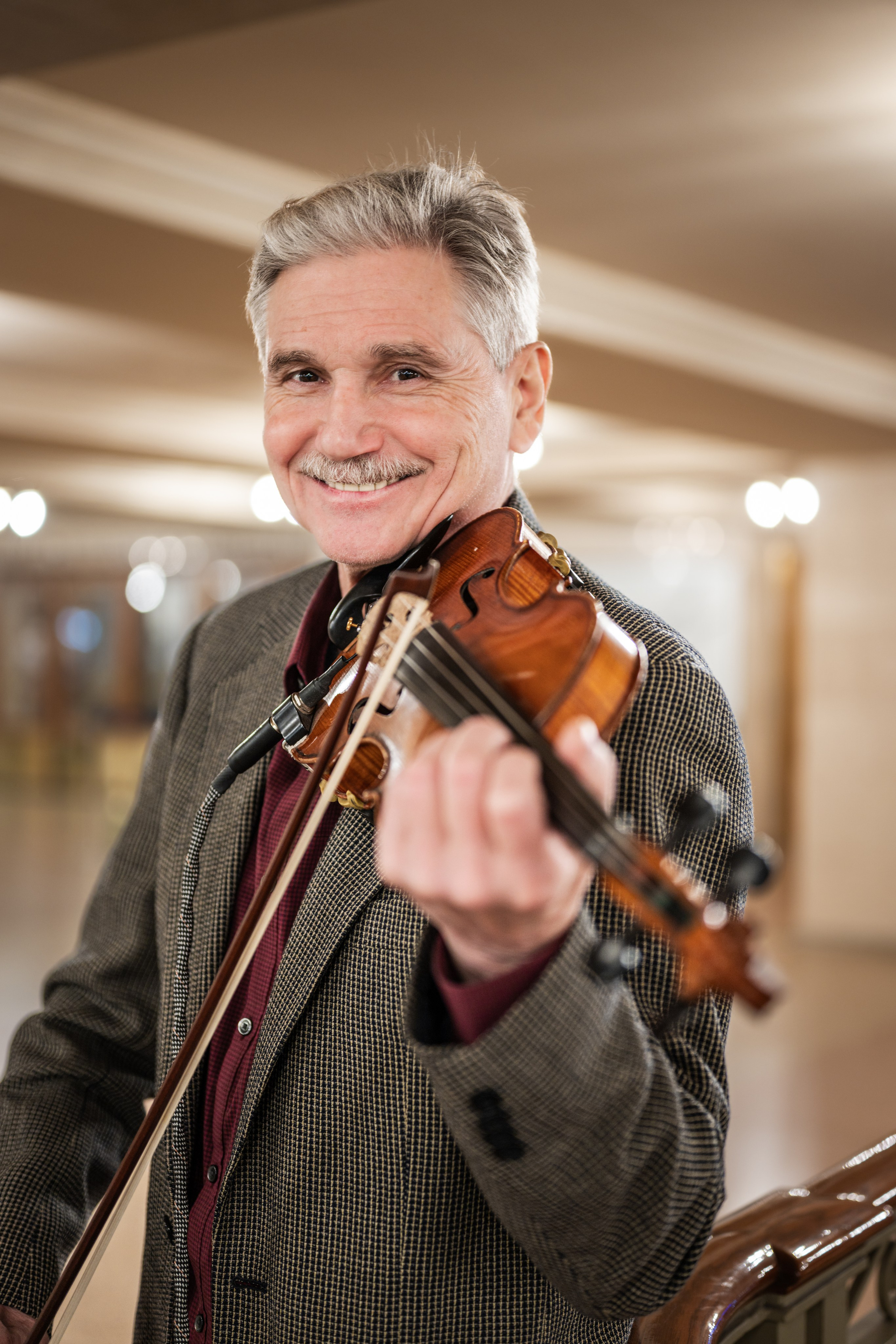 Violinist at Grand Central | NYC Portrait Session. Photography company in NYC — Sirius Proxima Photography