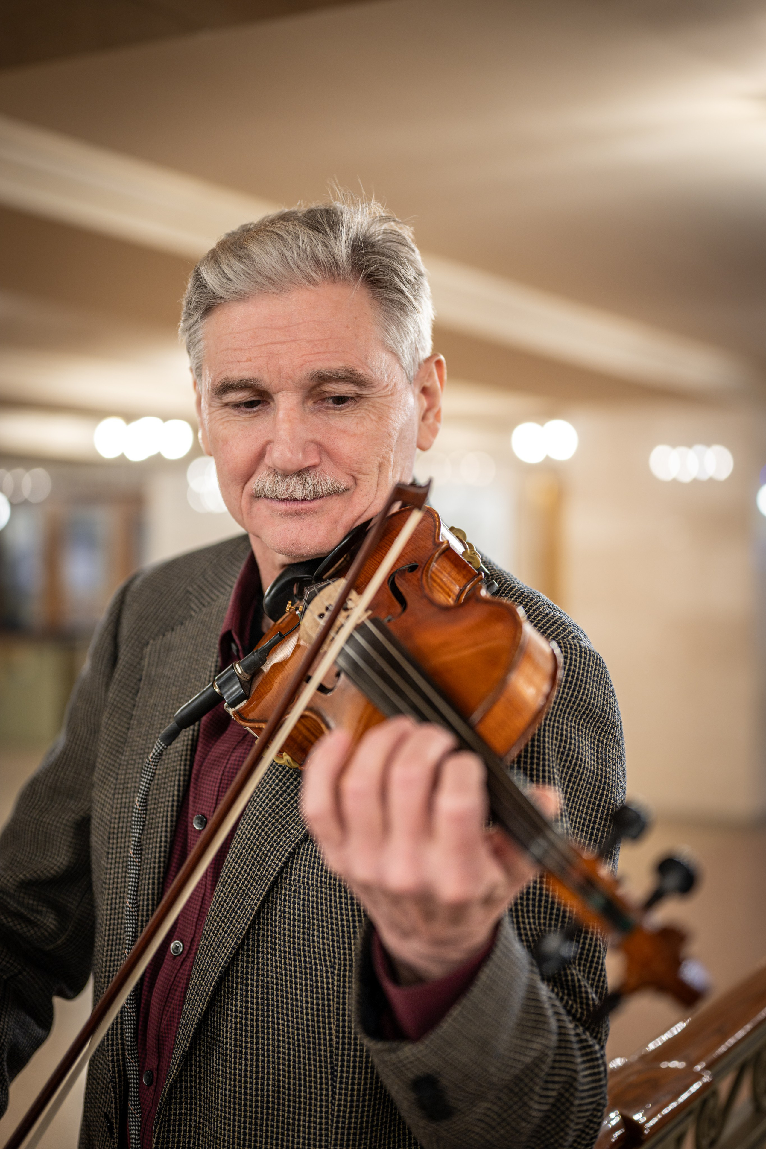 Violinist at Grand Central | NYC Portrait Session. Photography company in NYC — Sirius Proxima Photography