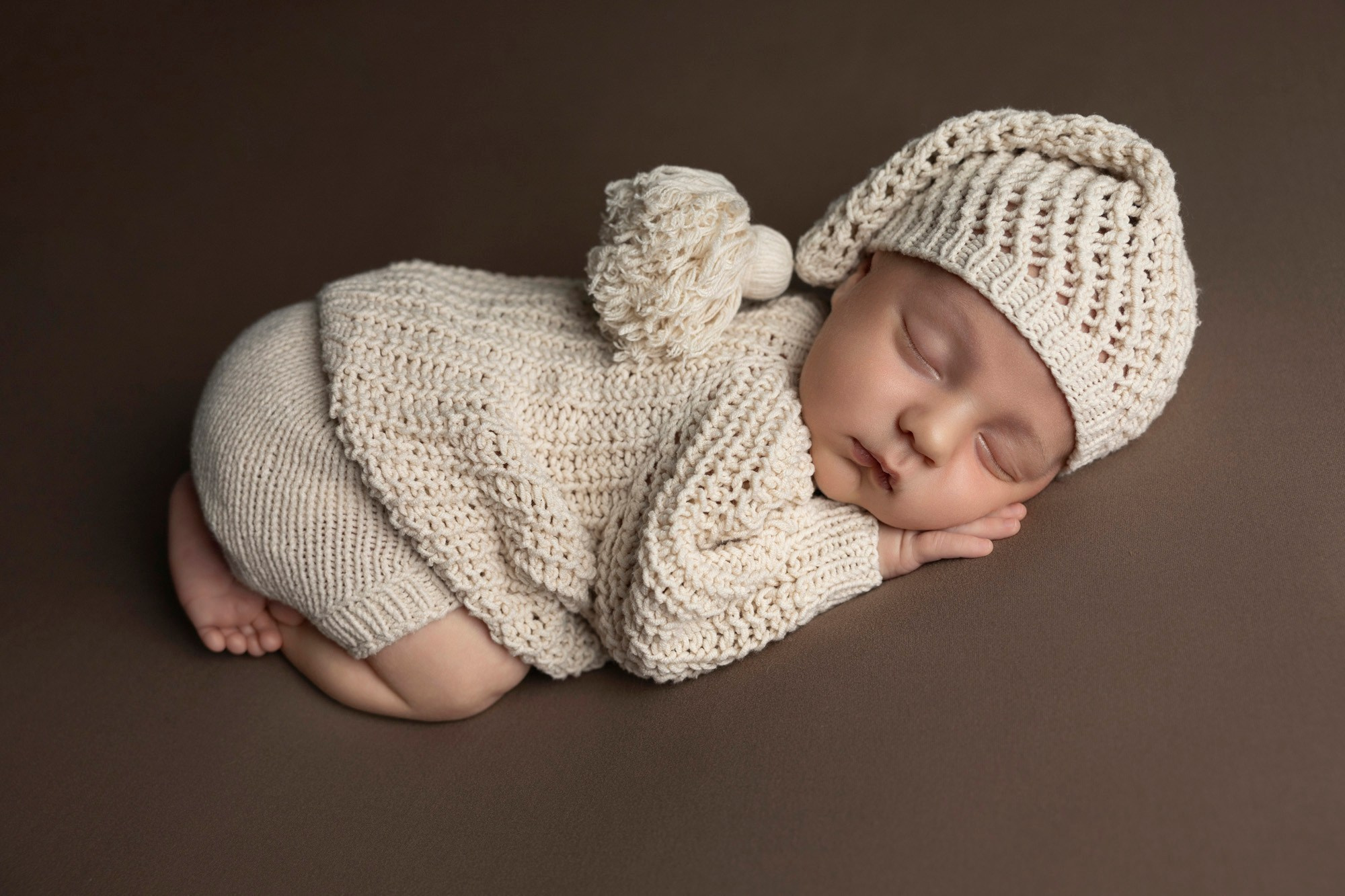 newborn photoshoot in natural brown colors