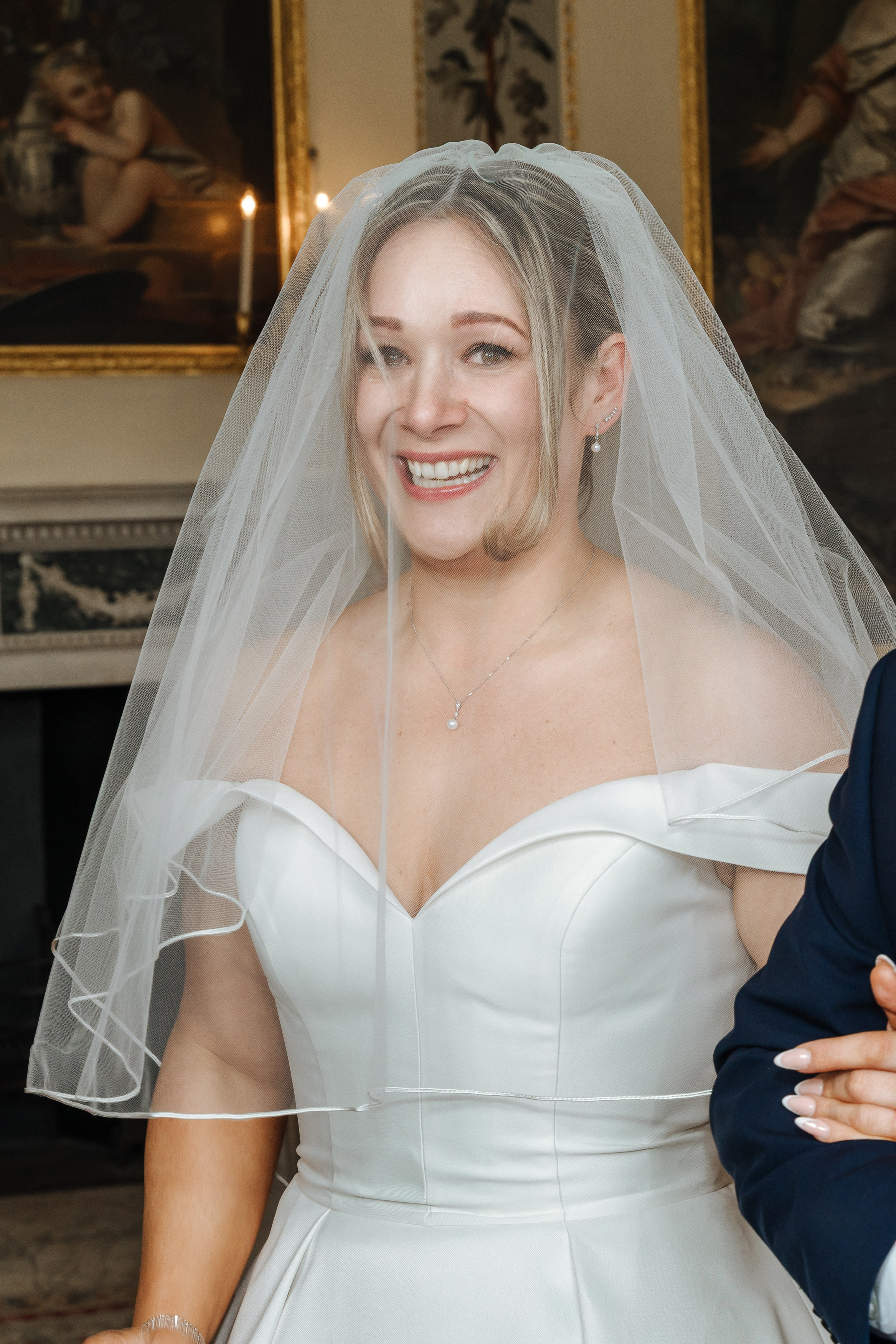 Close-up of wedding dress details and bridal accessories, Luke and Nicola's wedding at Danson House