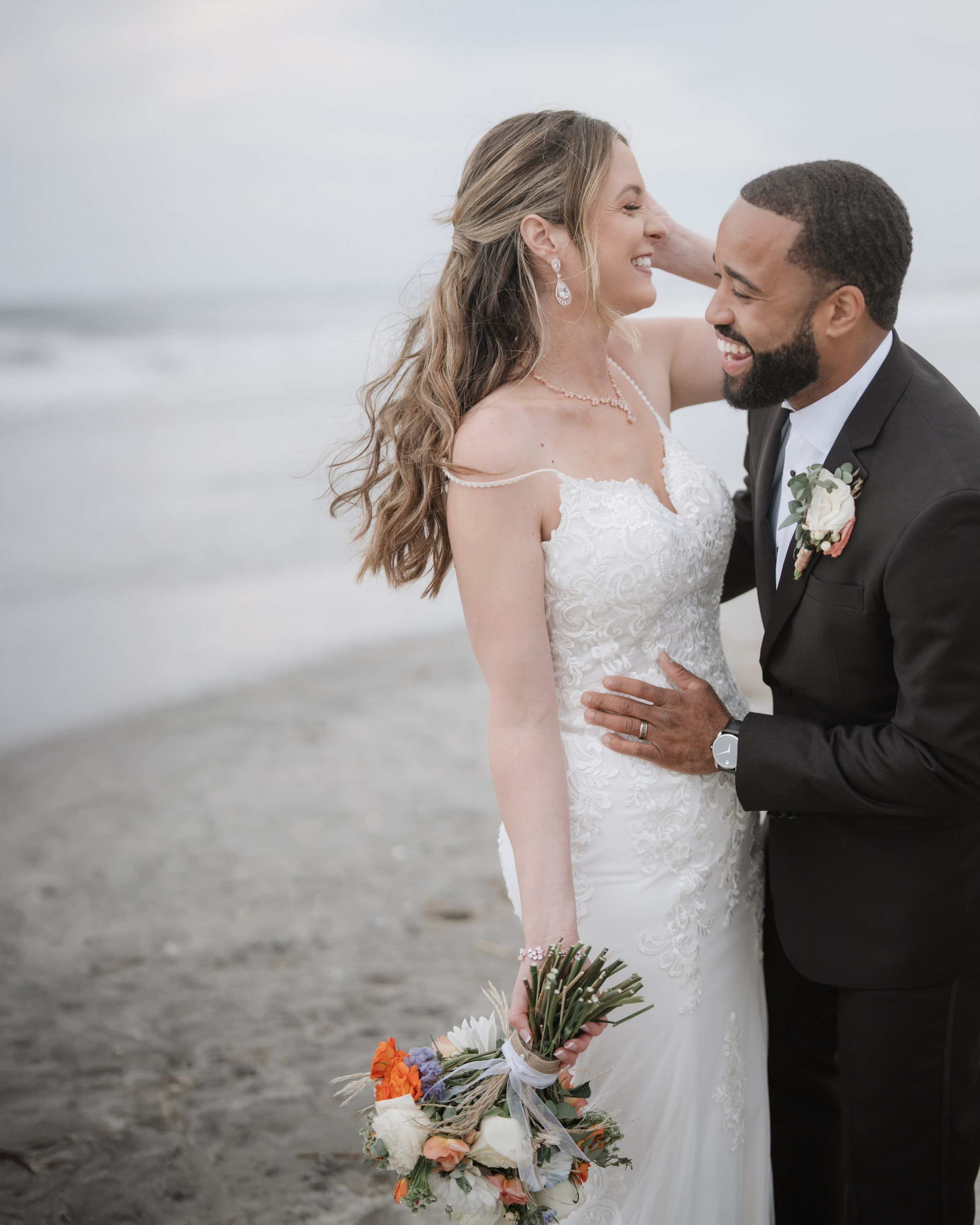 Wedding walk on the beach. Portrait and wedding photographer in New York