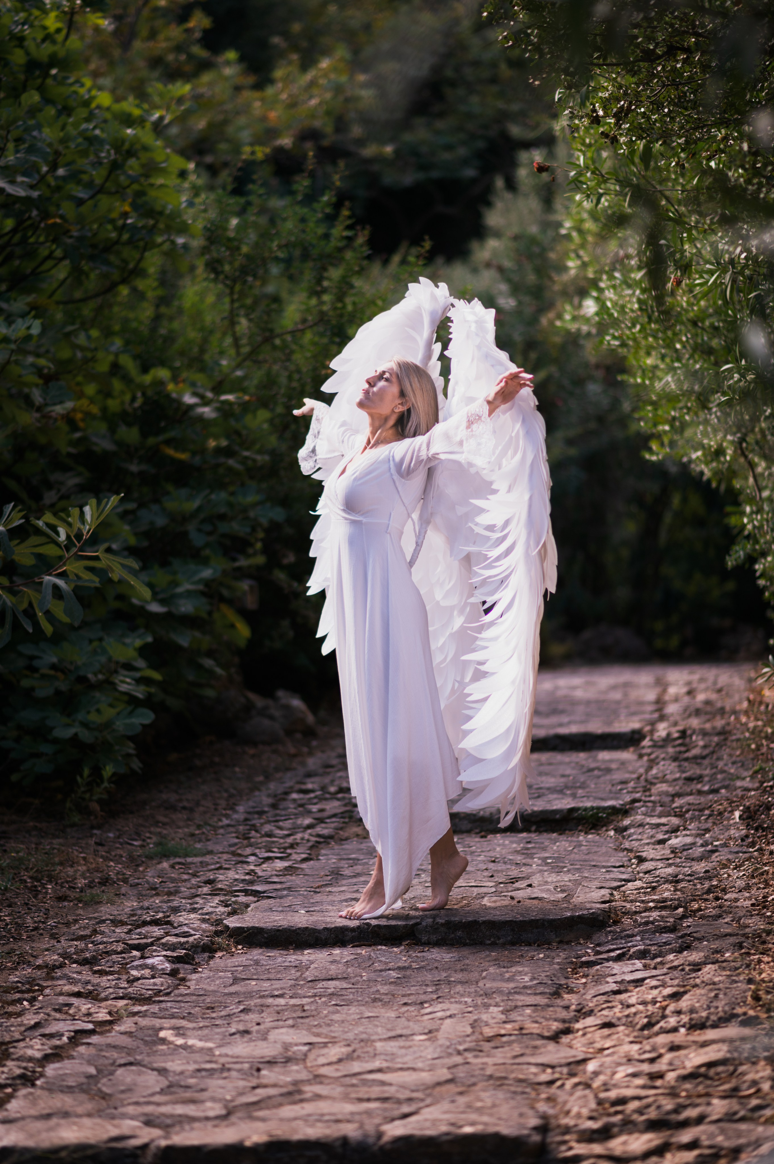 Angel in woods. Photograper in Chania, Crete