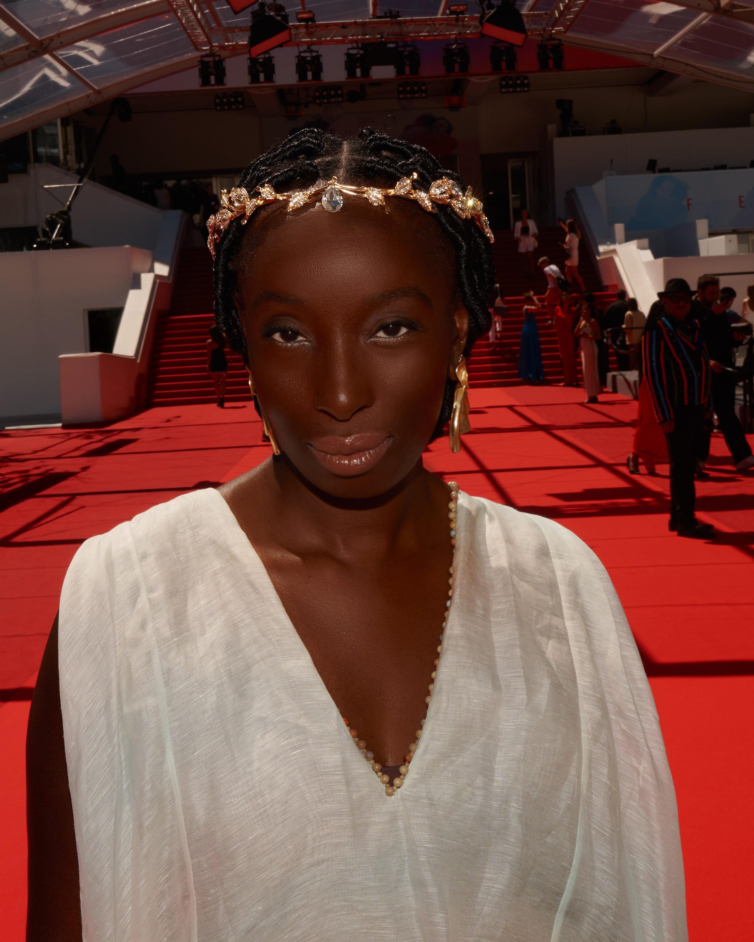 Cannes Film Festival red carpet photographer Alisa Postnykova shooting Eunice Olumide 2026