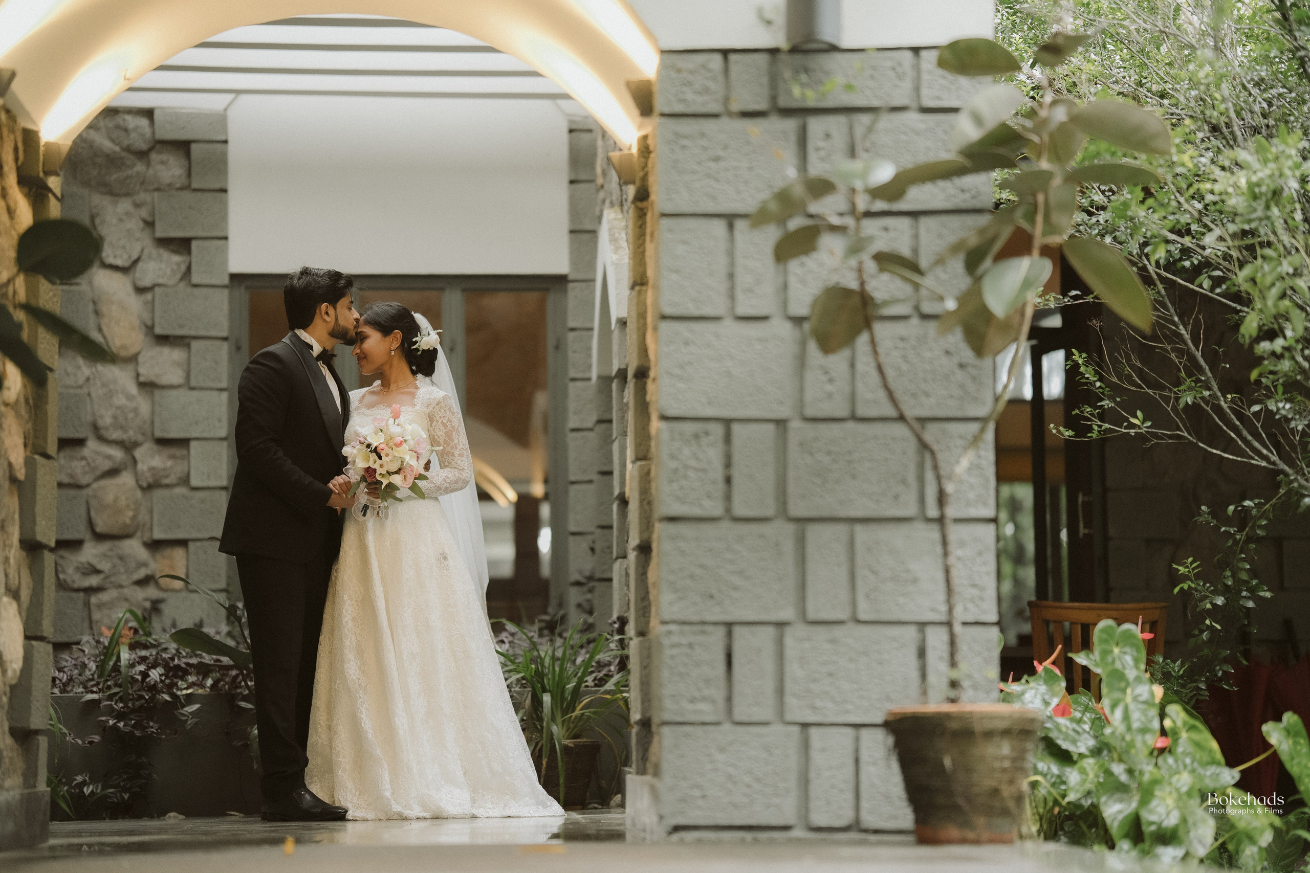 A Love Story Rooted in Faith: Tabitha & Harry’s Christian Wedding in Idukki. BokehAds | Wedding Photography & Films