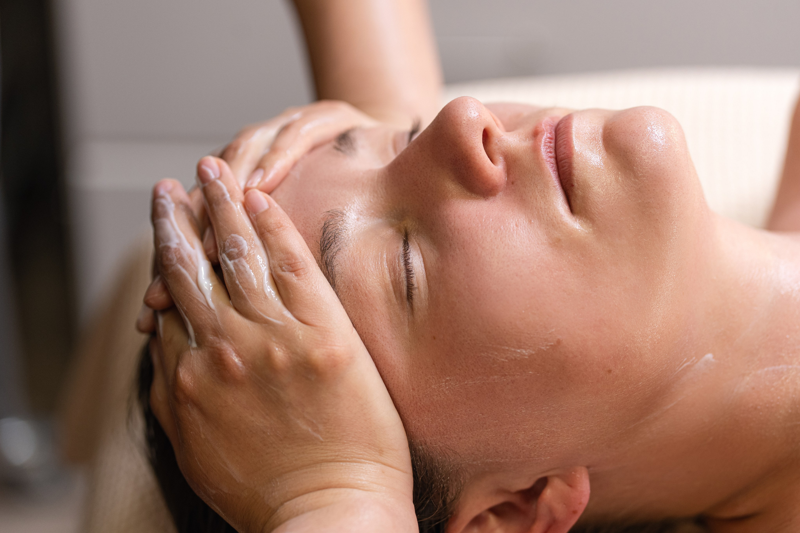 Facial treatment photography Los Angeles esthetician performing skincare service