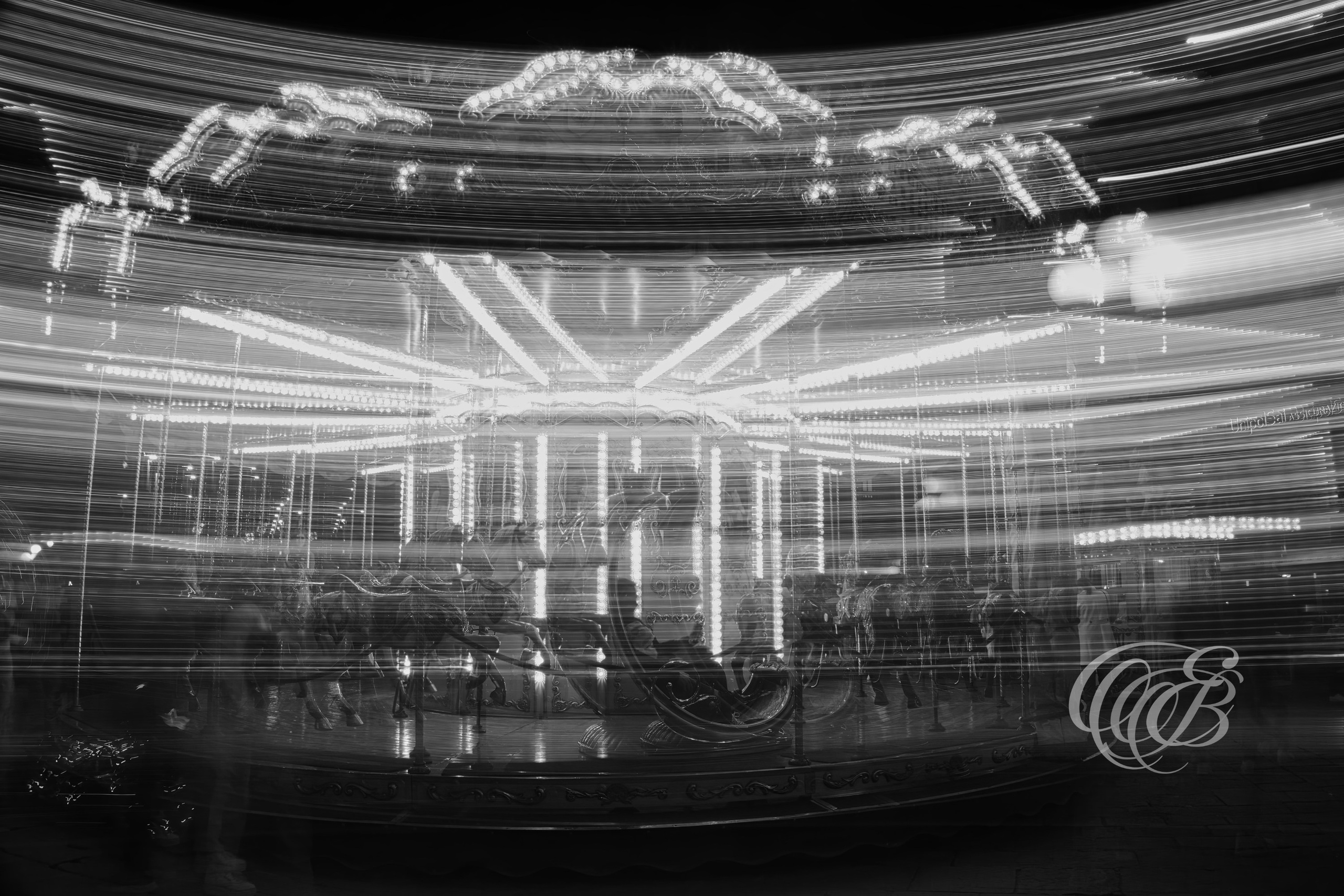 Florence Italy - Moving Carousel - B&W - Eduardo Bartoli Fine Art Photography - Black-and-white photograph of the moving carousel in Florence, Italy – fine art photography by Eduardo Bartoli.
