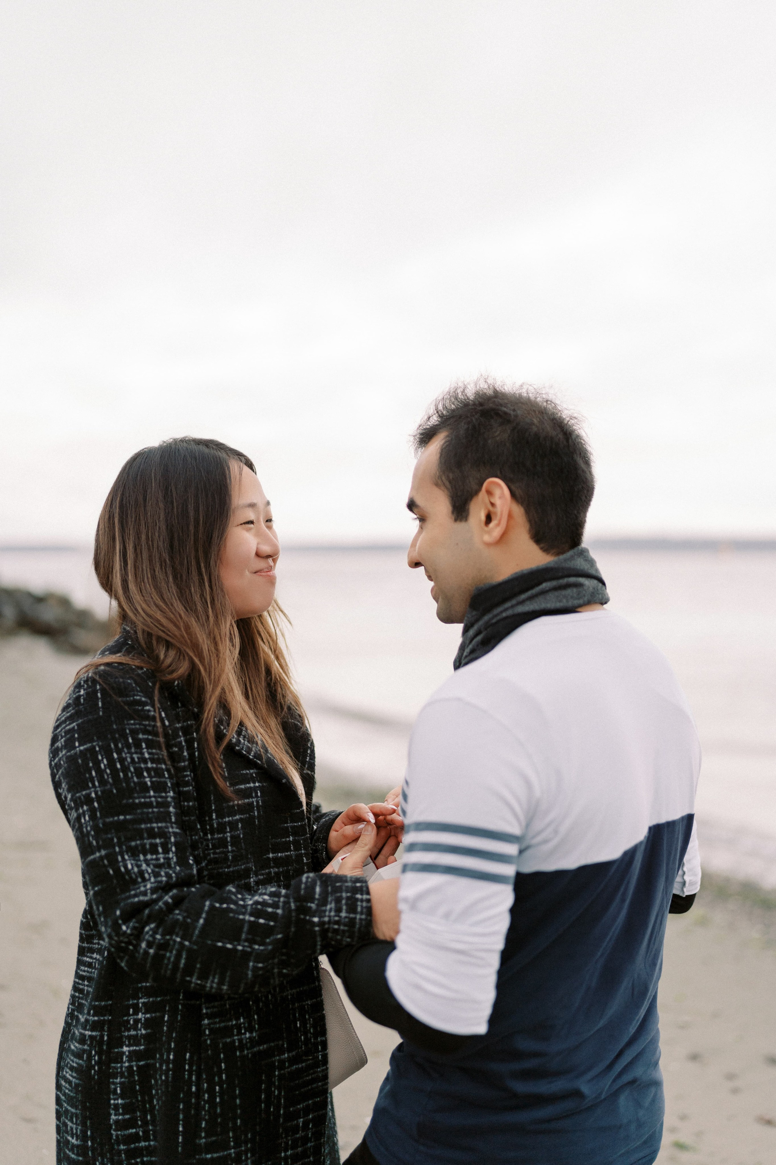 Proposal. December 2024. Alki Point Lighthouse, Washington state. EVAN ARISTOV WEDDING PHOTOGRAPHY — Seattle Wedding Photographer