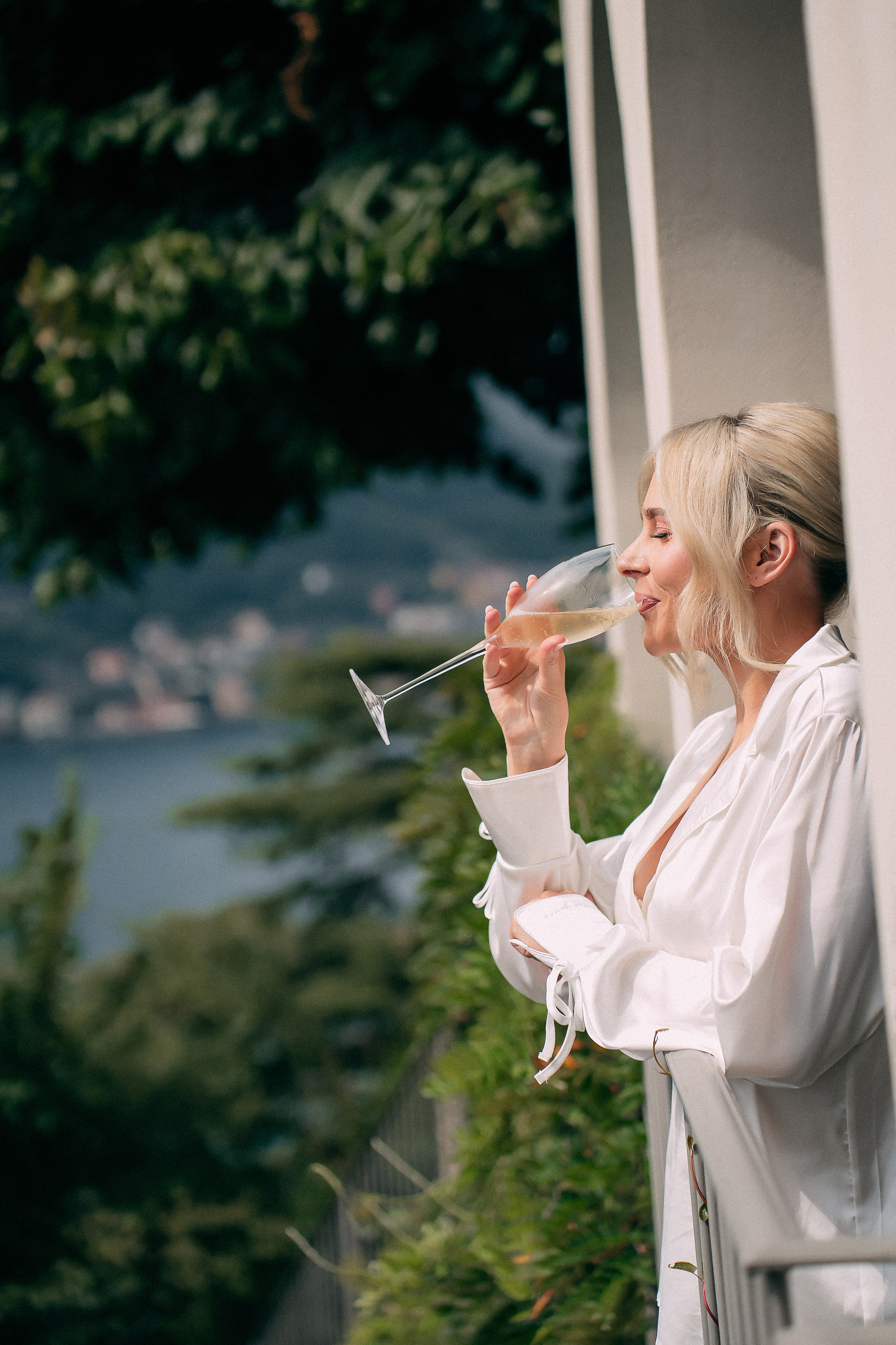 Bride admiring the Lake Como view from Villa Lario, Italy