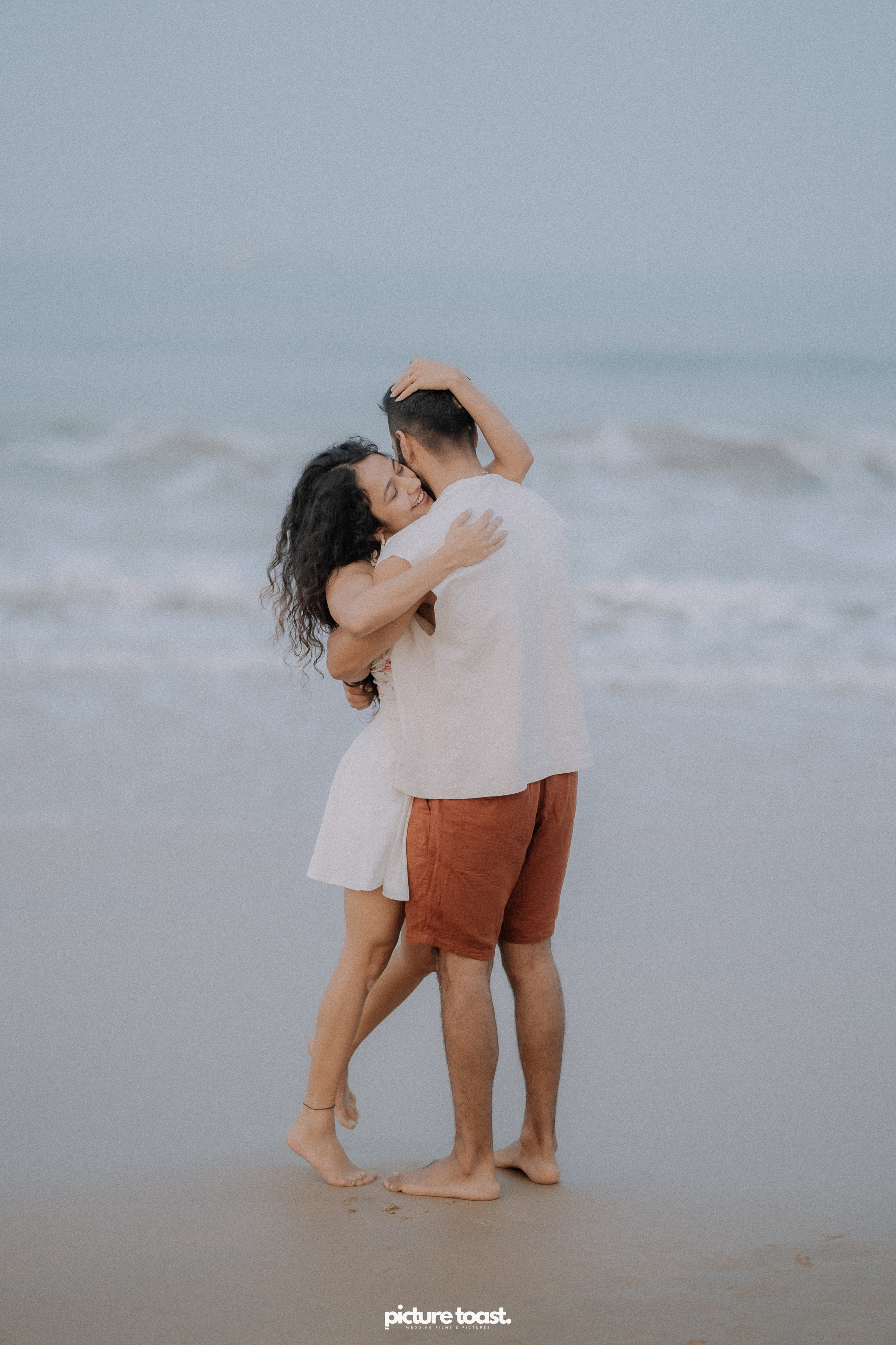 Love In The Beach. Fine art Wedding Photographers in India & Canada