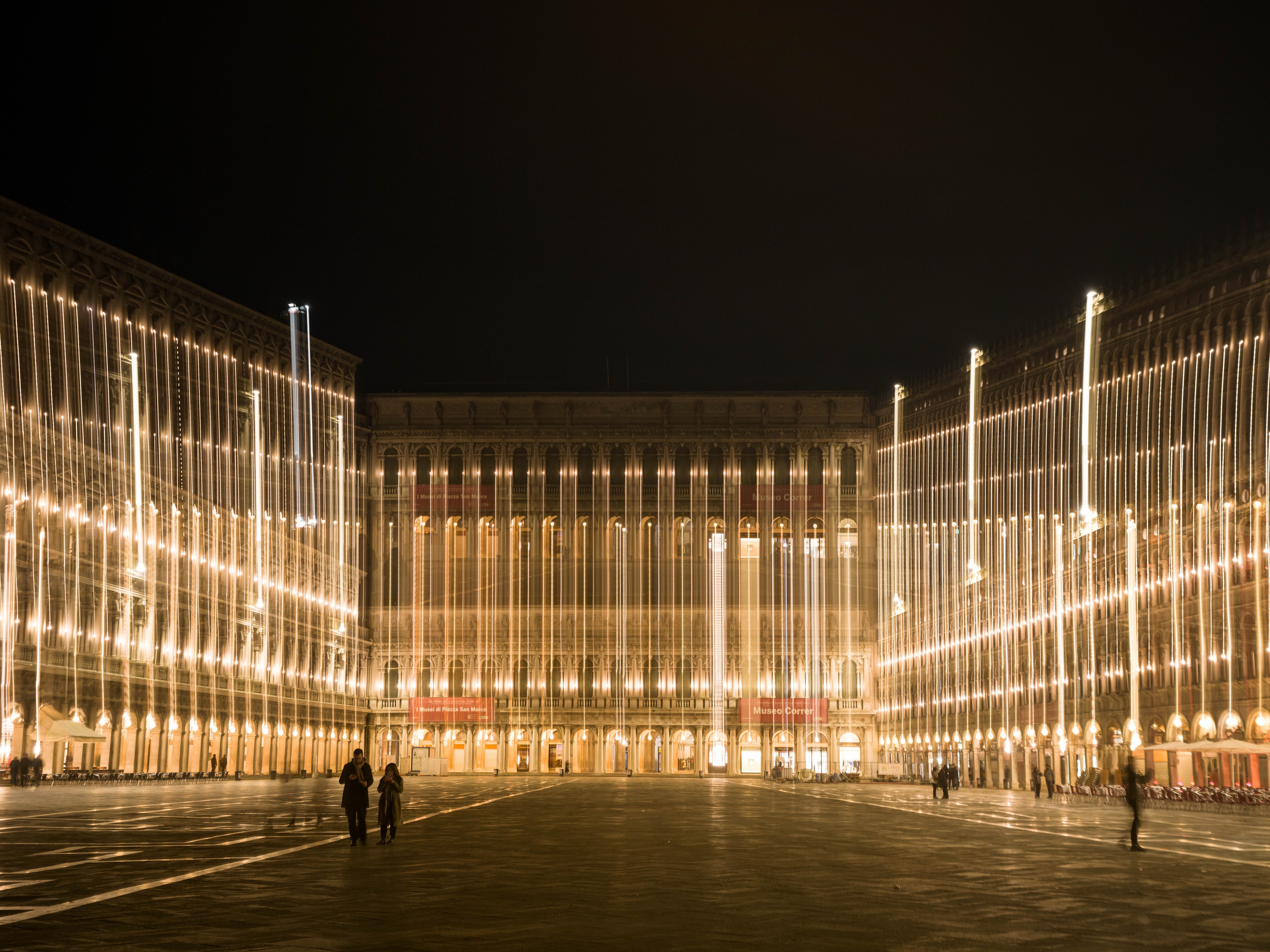 Piazza San Marco in Venice at night with vertical light installation and long exposure effect