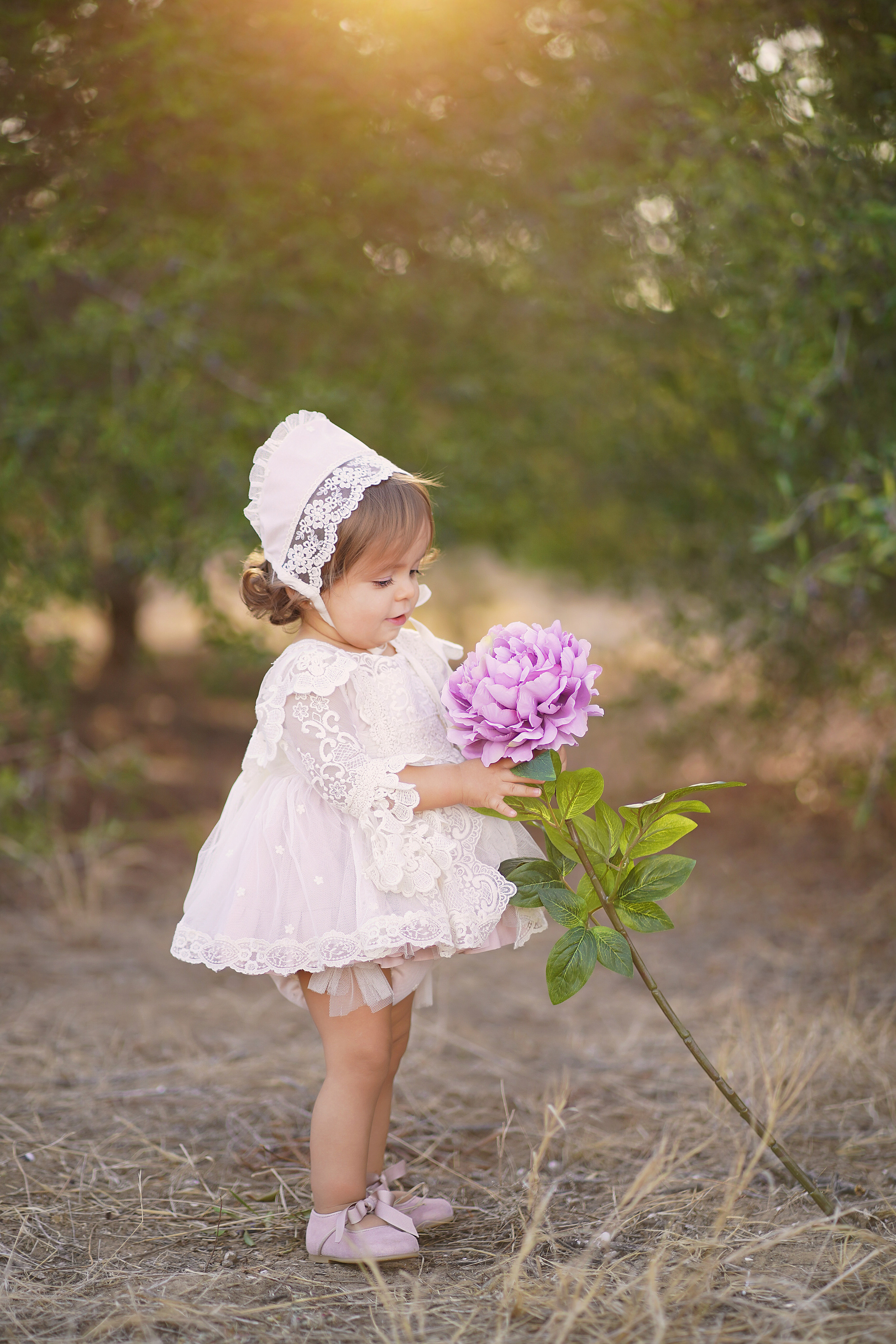 Lola bautizo para album. Fotógrafo de bodas y familias en España, Málaga, Marbella